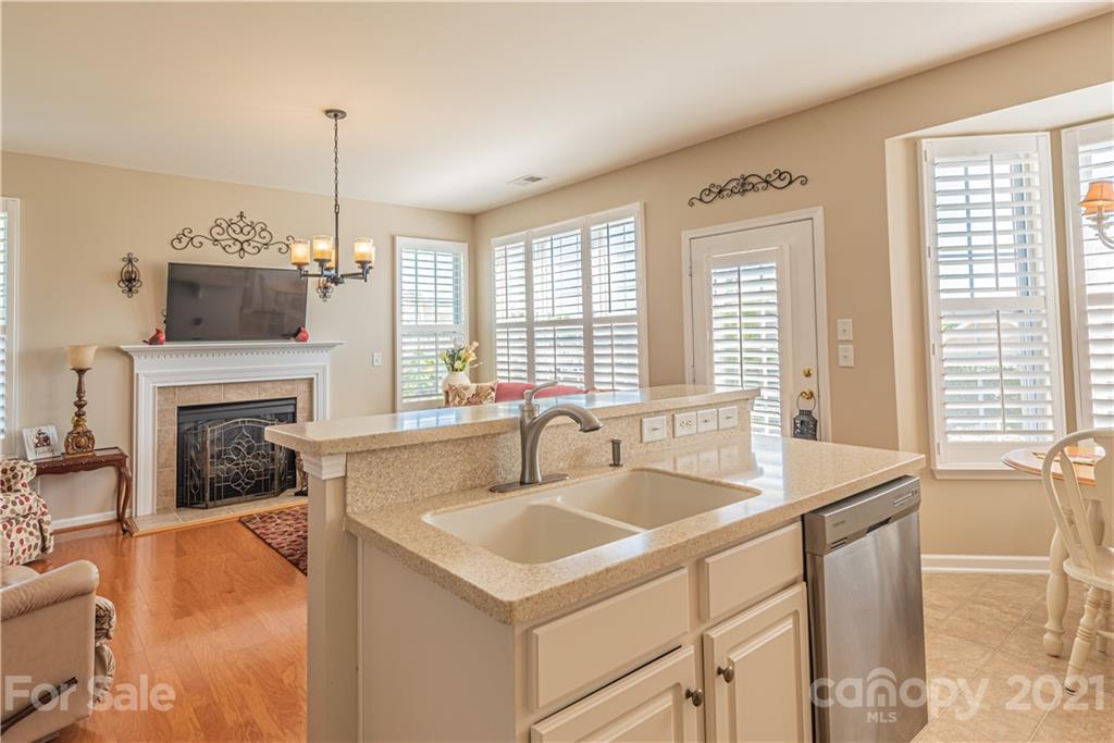 279 Garnet Court, Unit 549 Fort Mill, SC 29708 - Photo 16 of 47 a kitchen with a sink and a stove