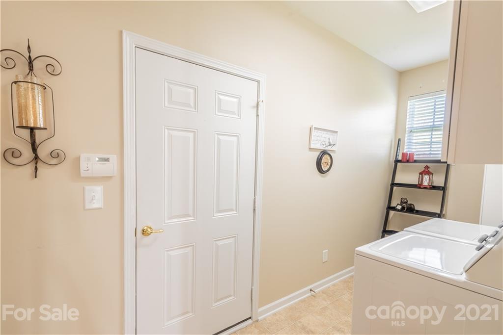 279 Garnet Court, Unit 549 Fort Mill, SC 29708 - Photo 33 of 47 a bathroom with a shower toilet and sink