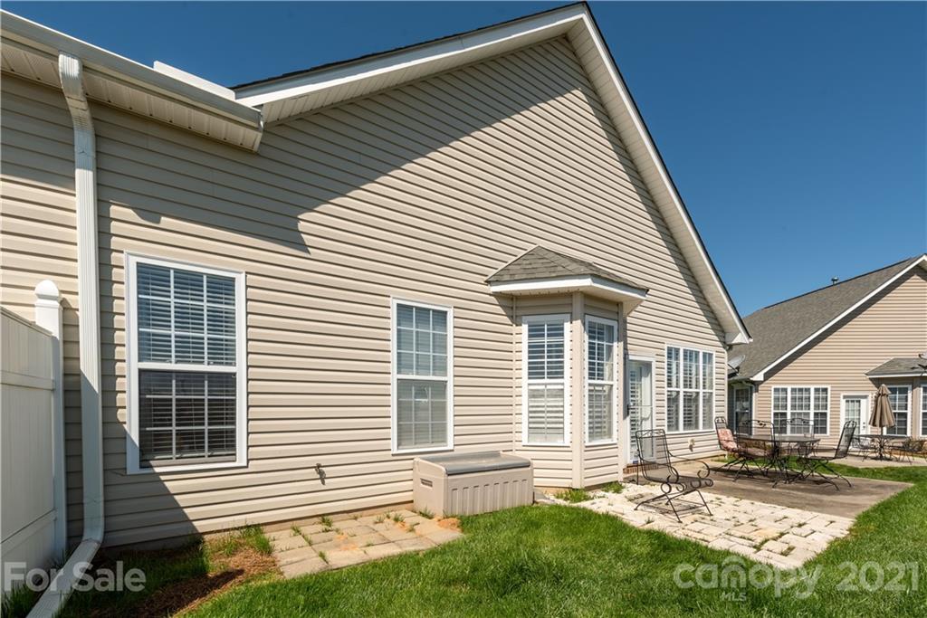 279 Garnet Court, Unit 549 Fort Mill, SC 29708 - Photo 37 of 47 a view of a house with a yard and sitting area