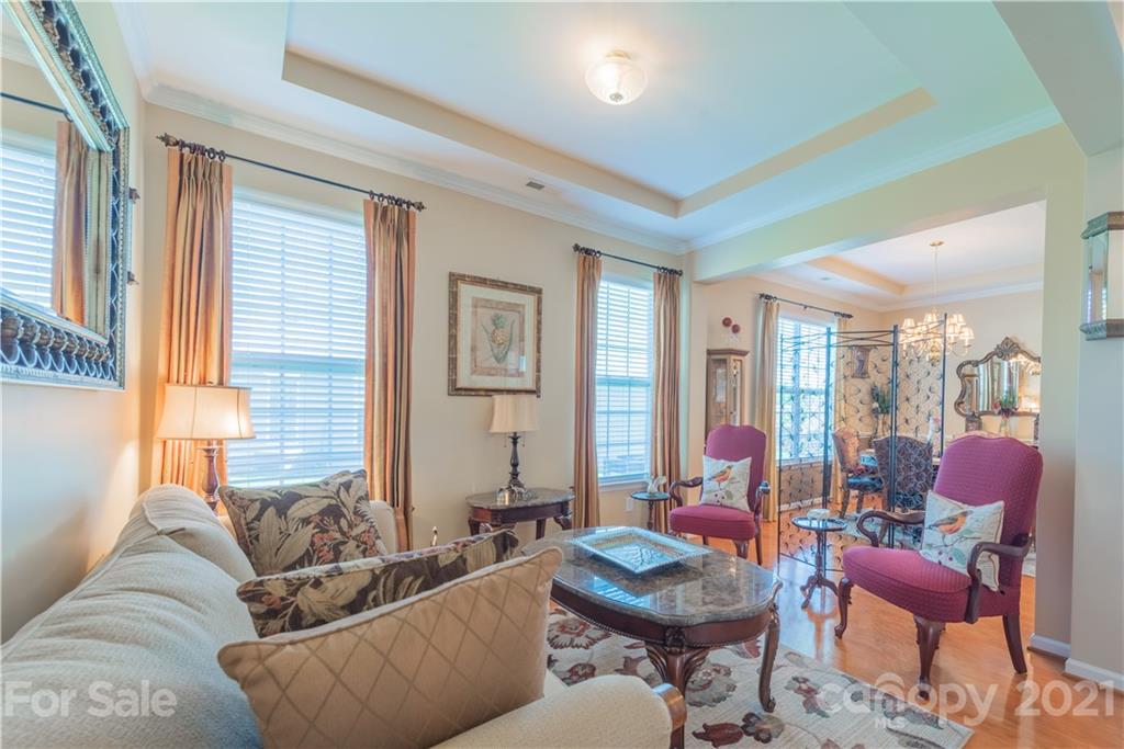 279 Garnet Court, Unit 549 Fort Mill, SC 29708 - Photo 8 of 47 a living room with furniture and a large window