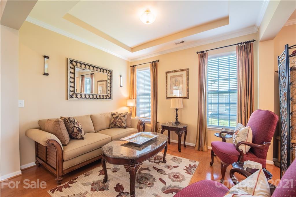 279 Garnet Court, Unit 549 Fort Mill, SC 29708 - Photo 10 of 47 a living room with furniture and a window