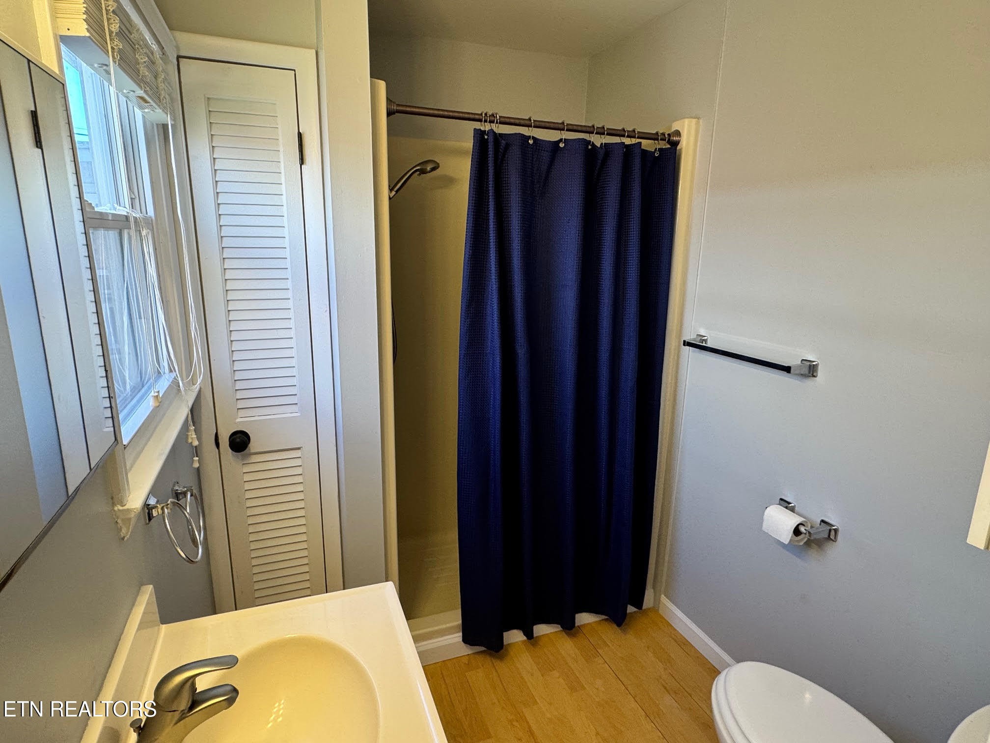 34 Hampton Square Crossville, TN 38555 - Photo 21 of 30 a bathroom with a sink toilet and shower