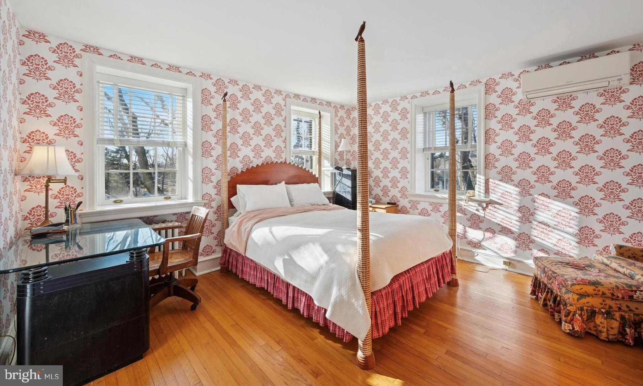 353 Woodley Road Merion Station, PA 19066 - Photo 18 of 20 a bedroom with a bed and wooden floor