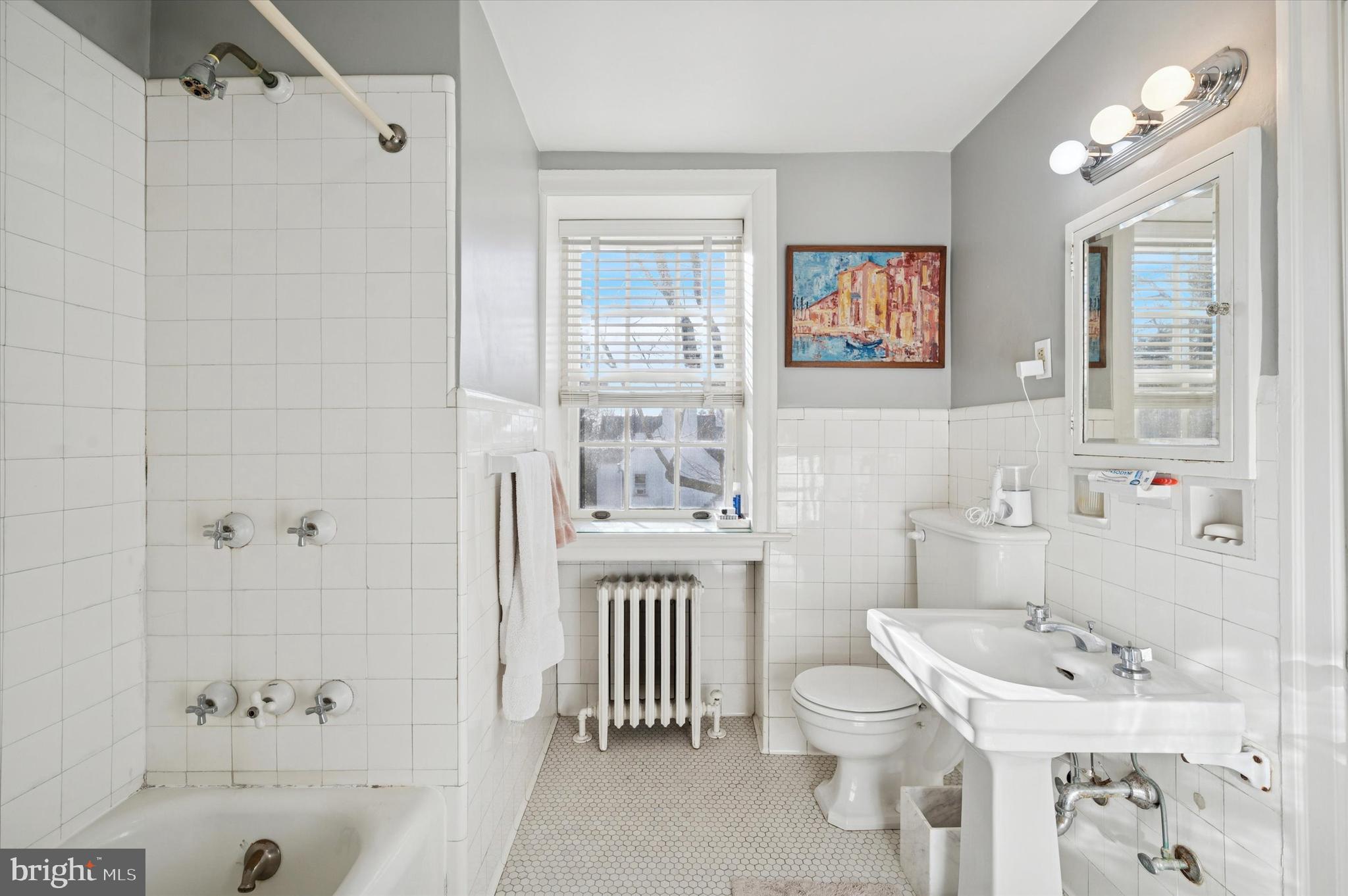 353 Woodley Road Merion Station, PA 19066 - Photo 19 of 20 a bathroom with a sink toilet tub and shower