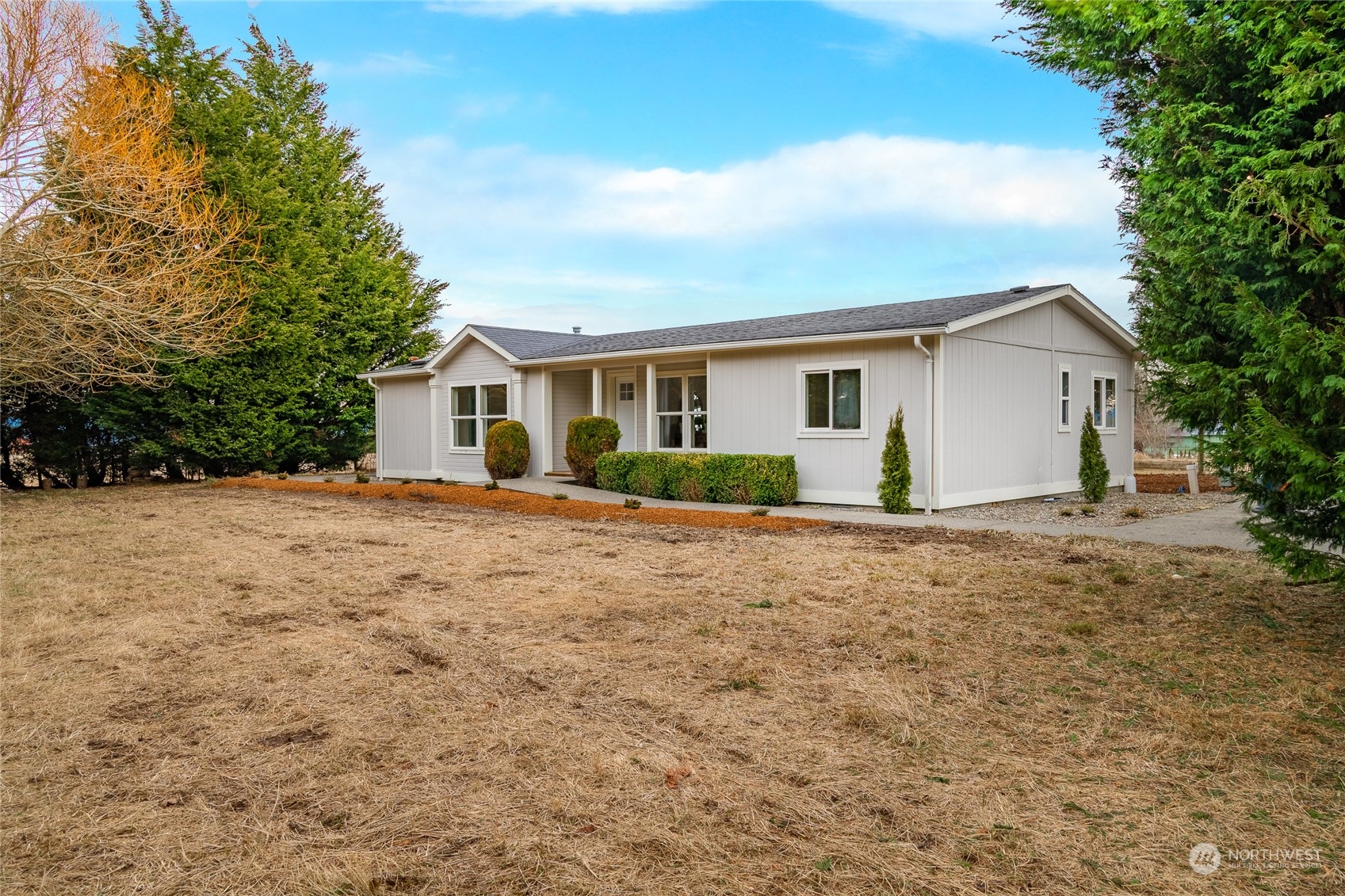 6671 Olson Road Ferndale, WA 98248 - Photo 1 of 40 a front view of house with yard and trees around