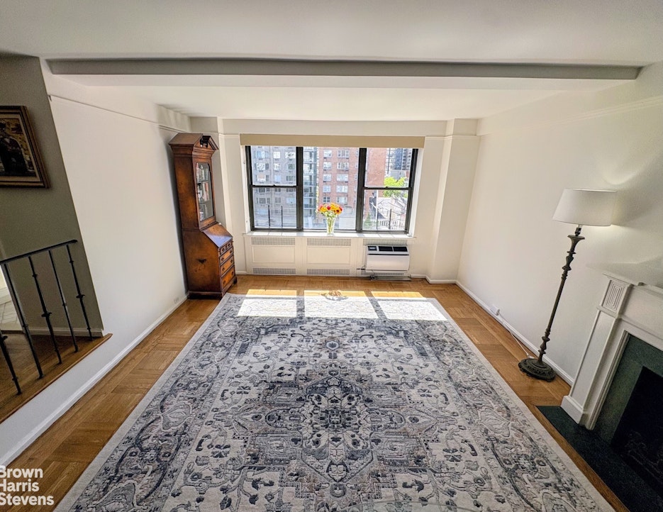 235 East 73rd Street, Unit 8D Manhattan, NY 10021 - Photo 11 of 12 a view of an empty room and window