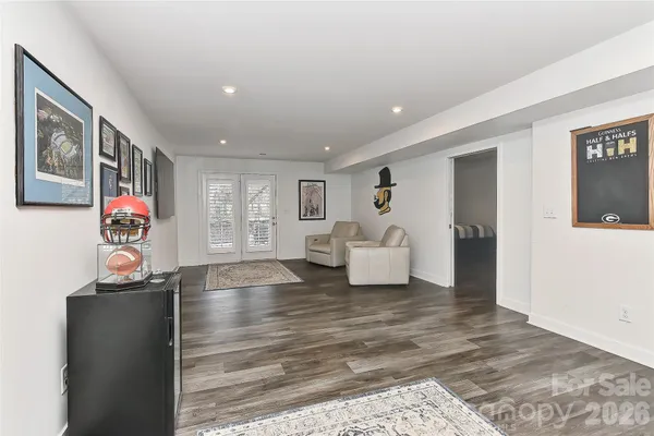 a spacious bedroom with a bed and furniture
