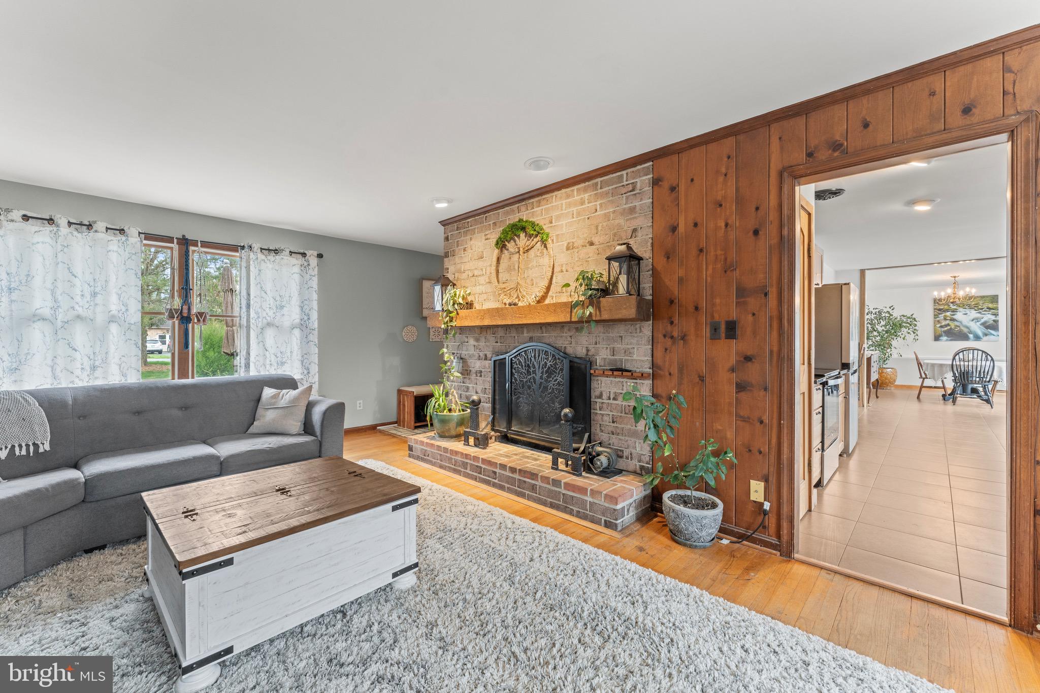 8 Manor Brook Road Monkton, MD 21111 - Photo 22 of 62 a living room with furniture and a fireplace