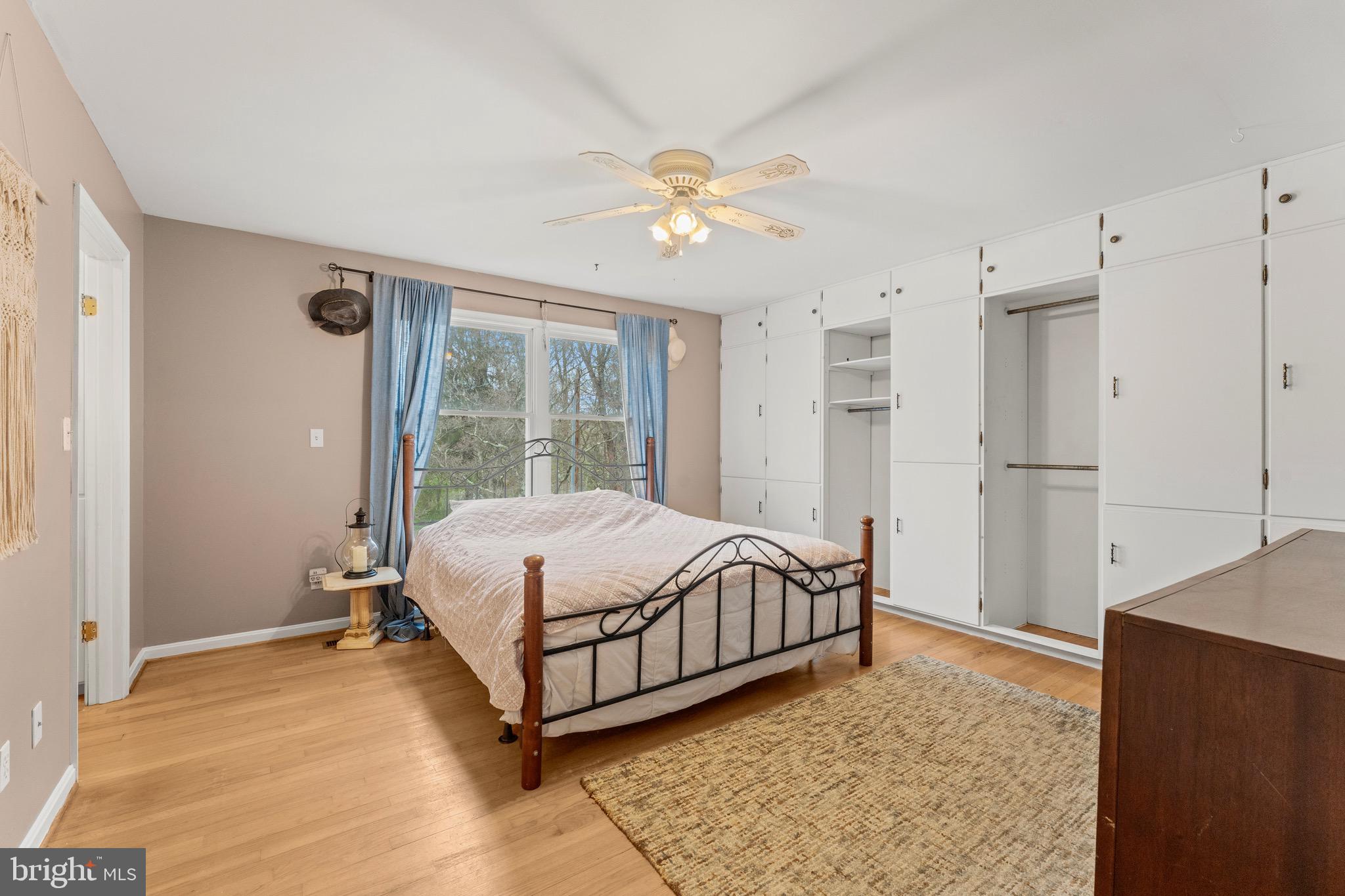 8 Manor Brook Road Monkton, MD 21111 - Photo 28 of 62 a bed room with a bed and a chandelier