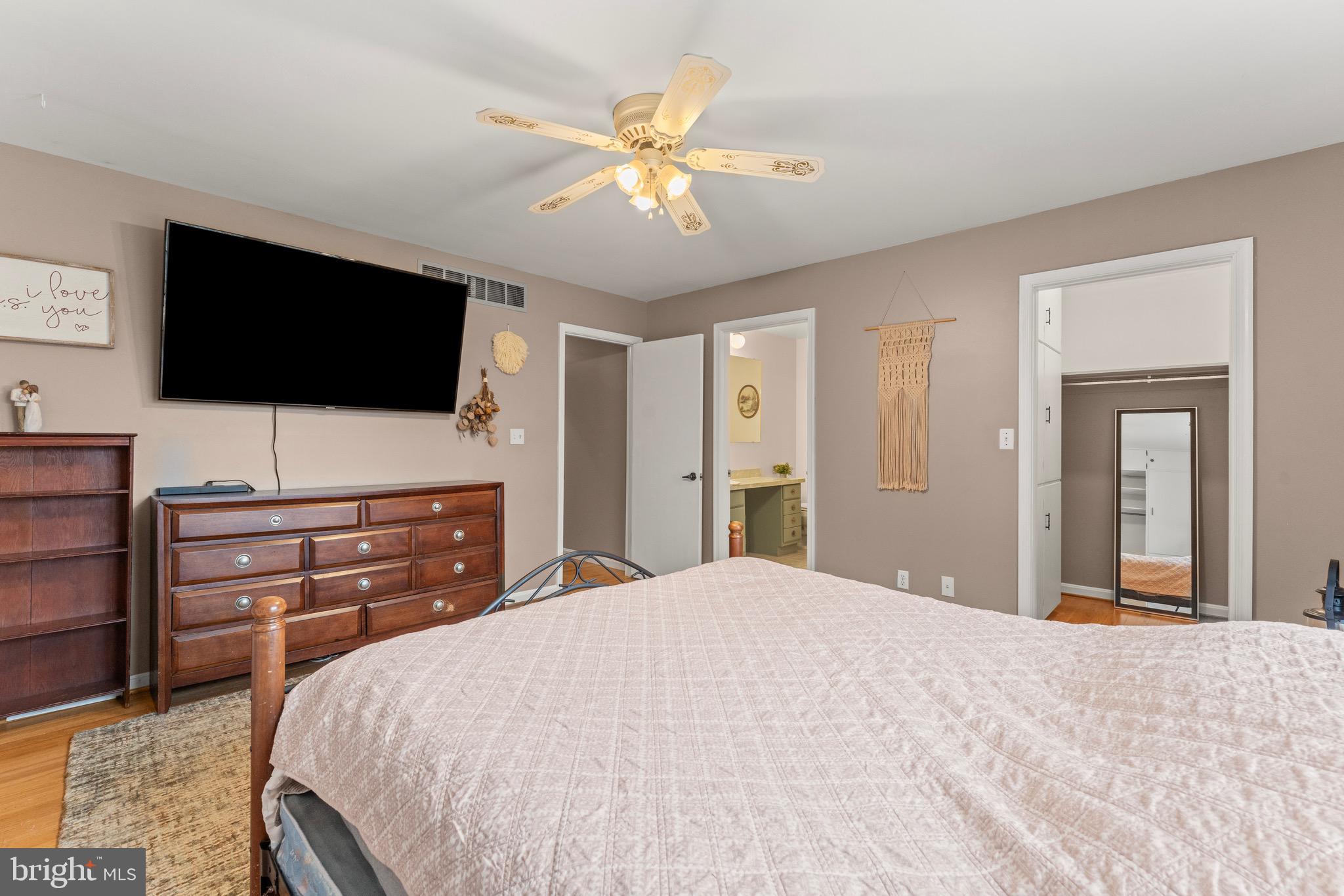 8 Manor Brook Road Monkton, MD 21111 - Photo 29 of 62 a bedroom with a bed and a flat screen tv