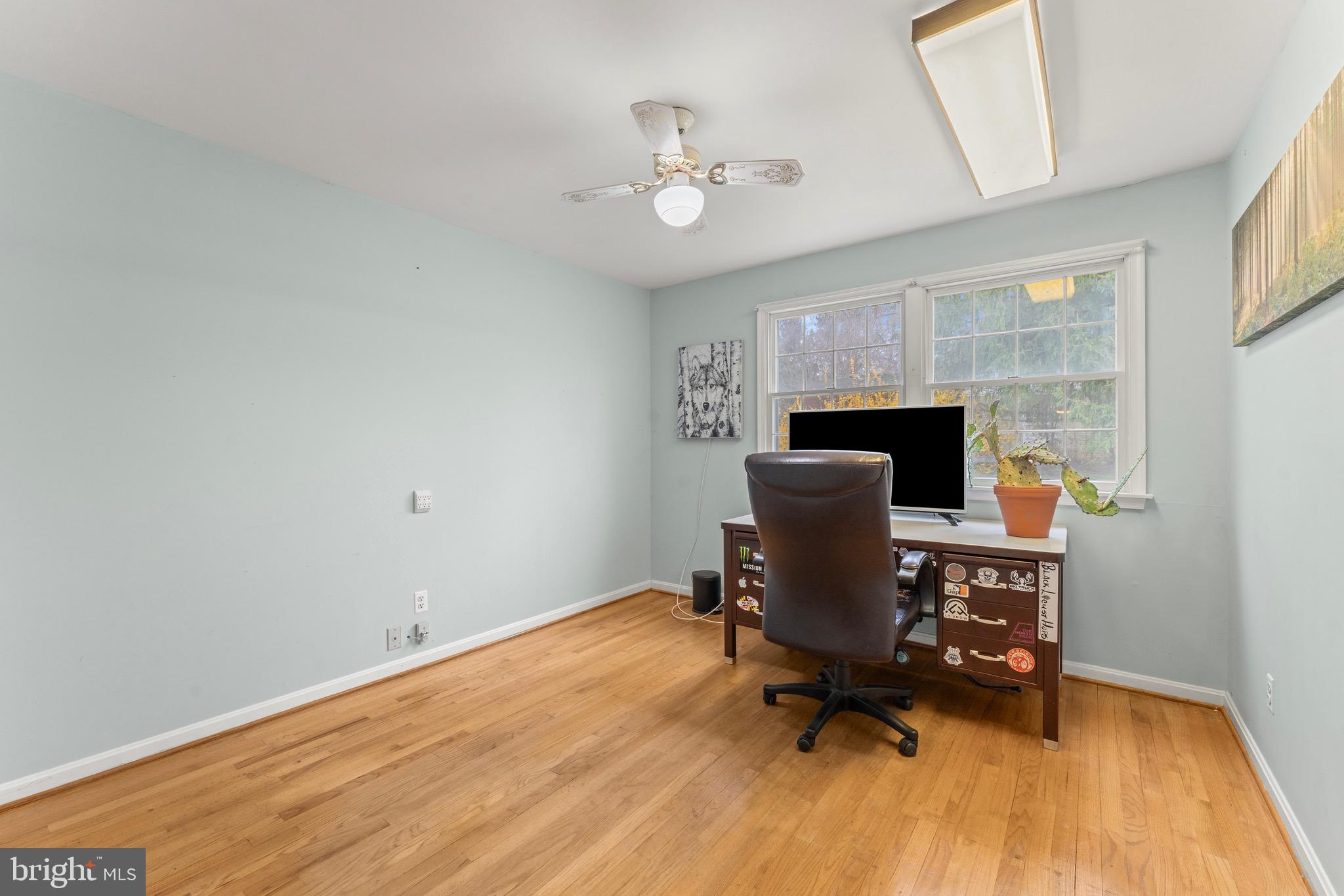8 Manor Brook Road Monkton, MD 21111 - Photo 37 of 62 a view of a workspace with furniture and a chandelier