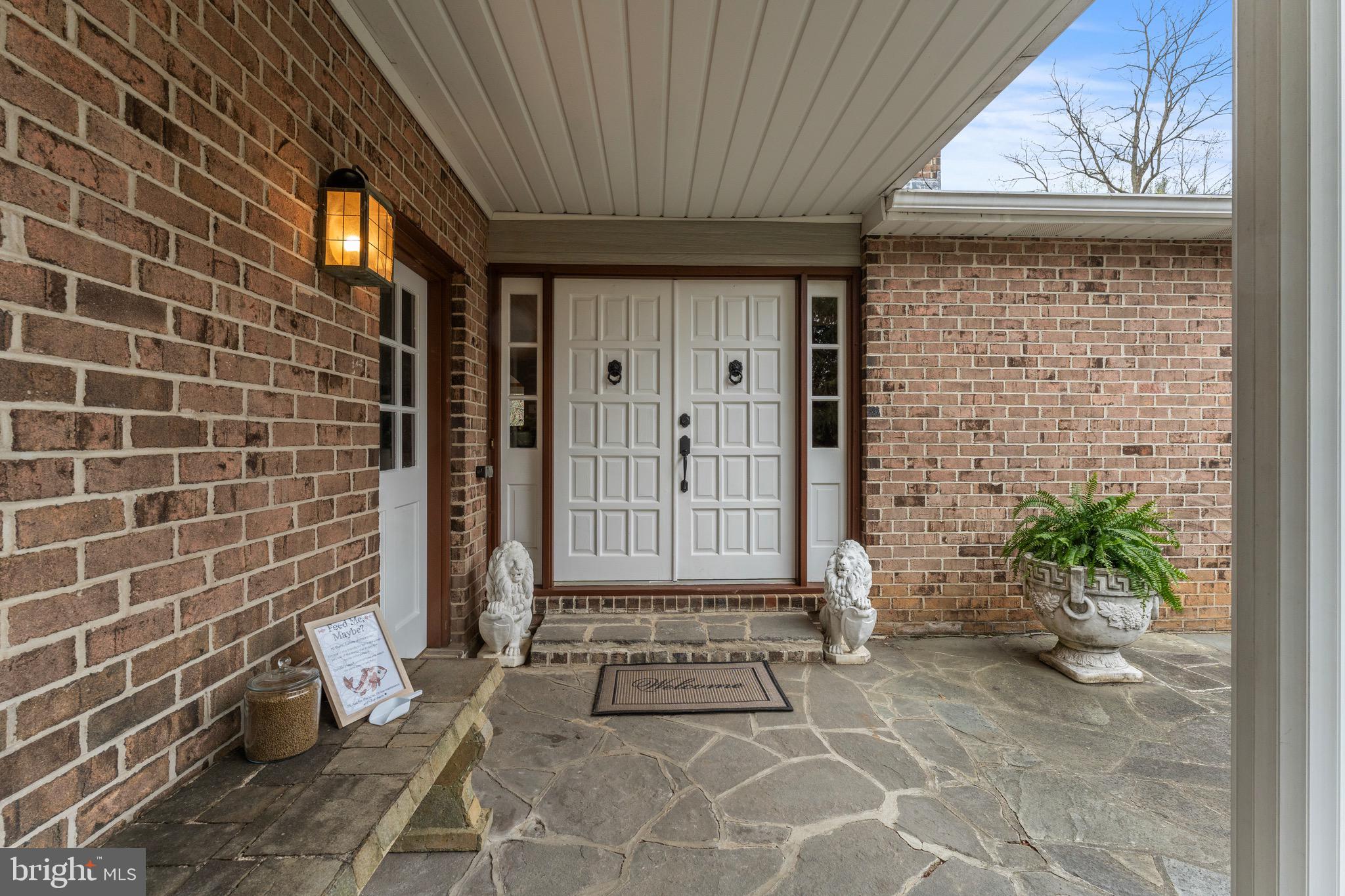 8 Manor Brook Road Monkton, MD 21111 - Photo 58 of 62 a view of a brick house with a outdoor space