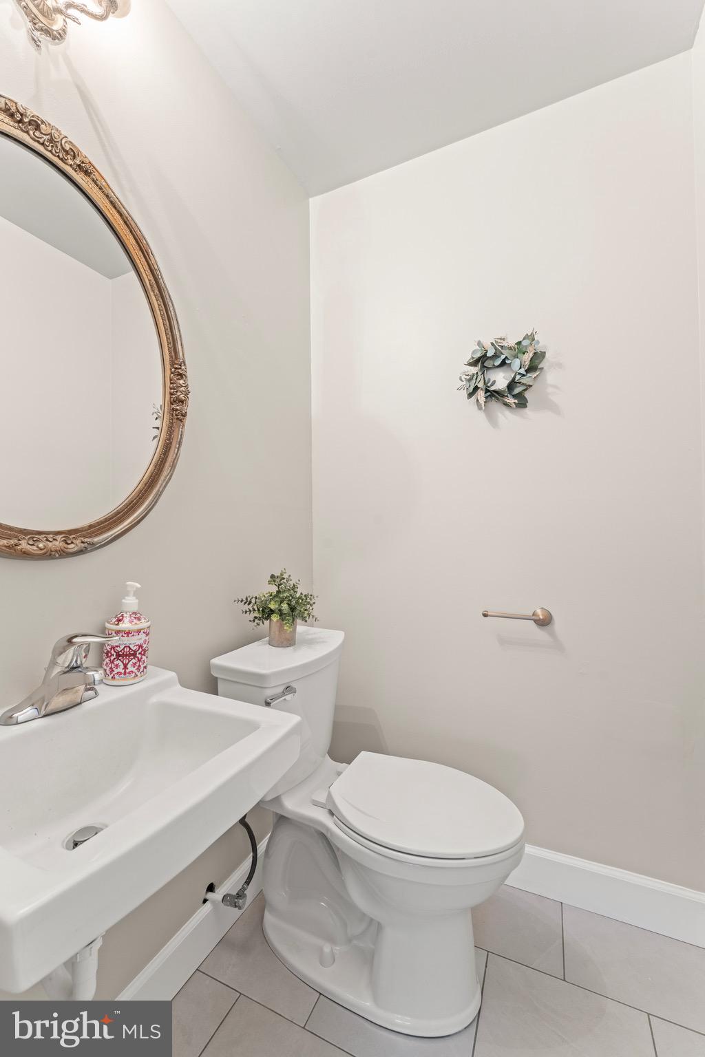 8 Manor Brook Road Monkton, MD 21111 - Photo 6 of 62 a bathroom with a sink mirror vanity and toilet