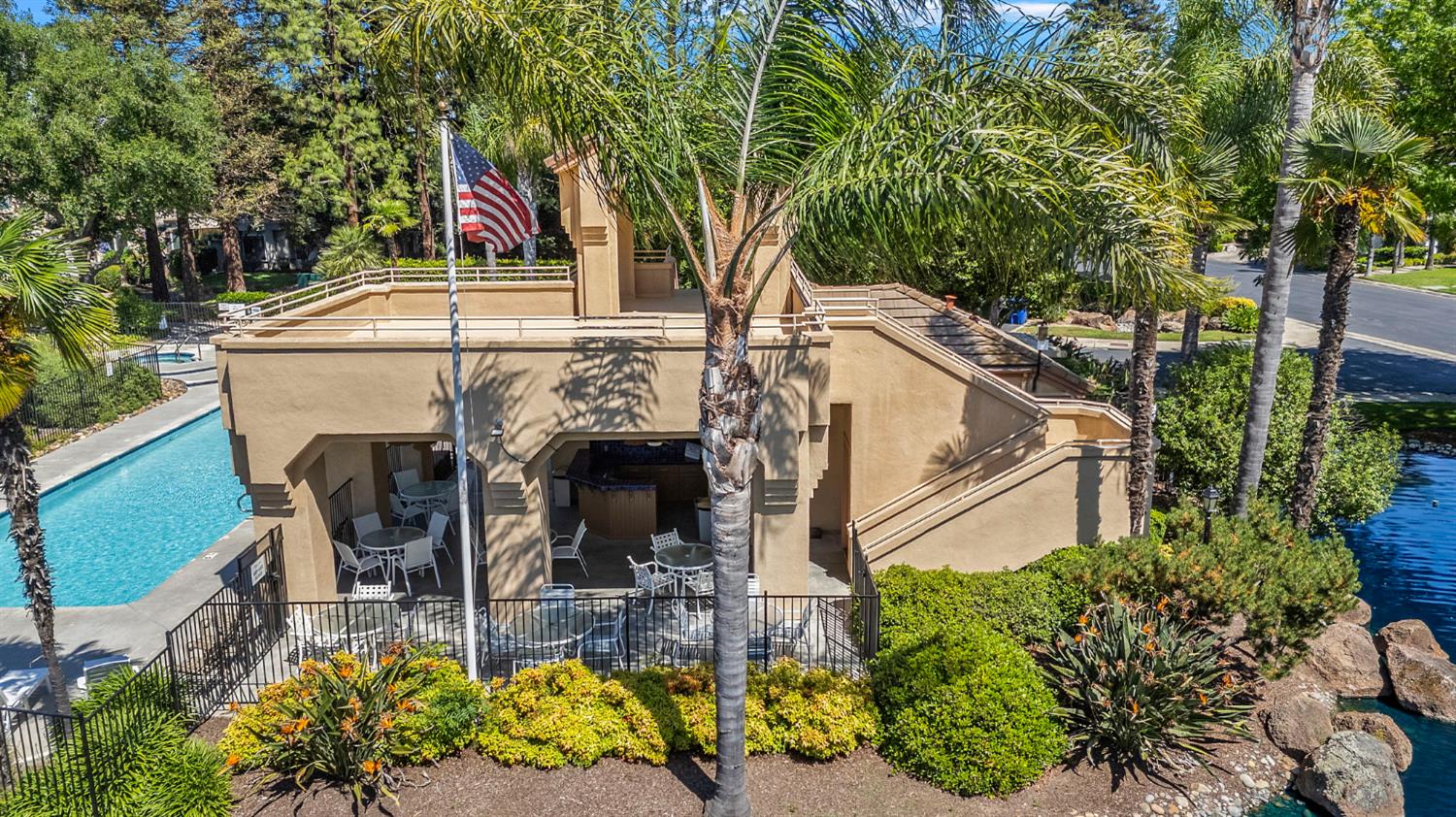 1013 Copper Lake Court Modesto, CA 95355 - Photo 57 of 66 a view of a patio with table and chairs and potted plants