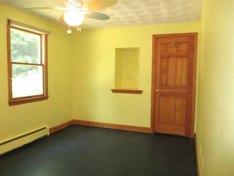 350 Training Field Road Chatham, MA 02633 - Photo 23 of 33 an empty room with windows and closet