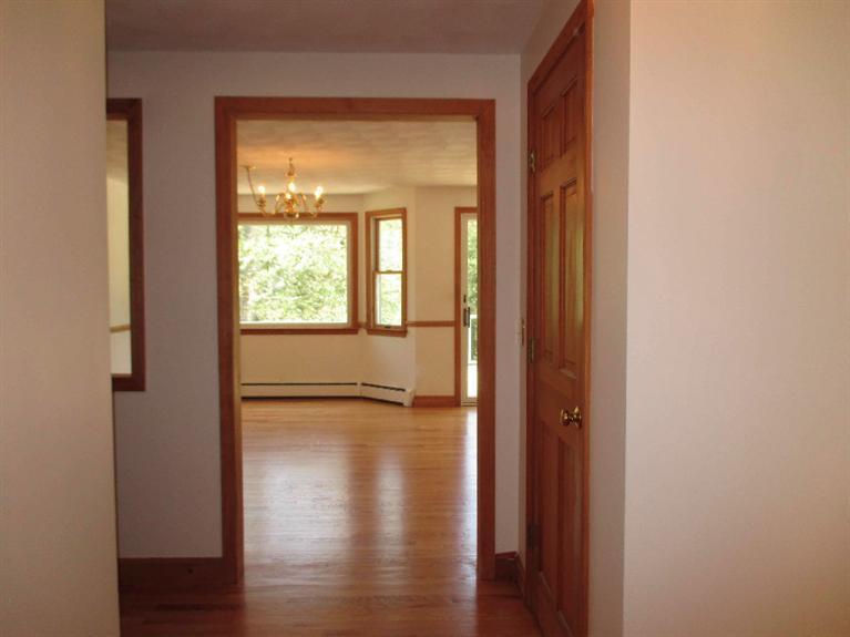 350 Training Field Road Chatham, MA 02633 - Photo 29 of 33 a view of empty room with wooden floor and fan