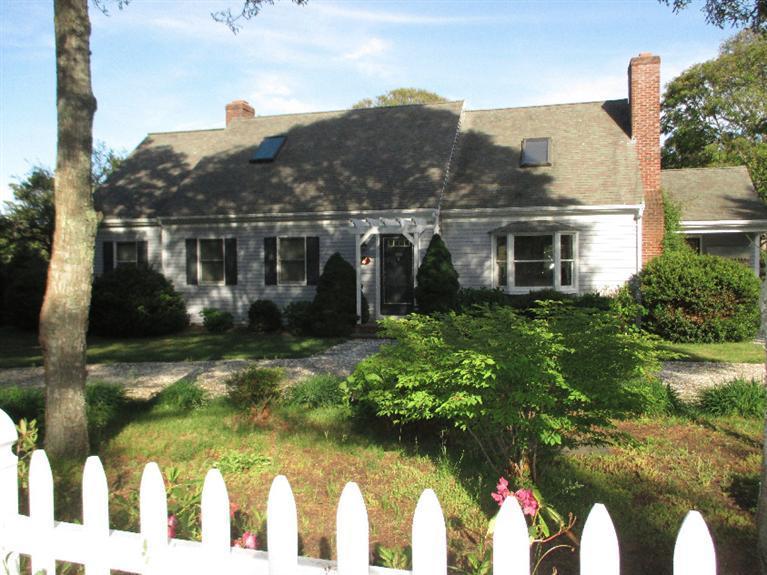 350 Training Field Road Chatham, MA 02633 - Photo 5 of 33 a front view of house with yard and green space