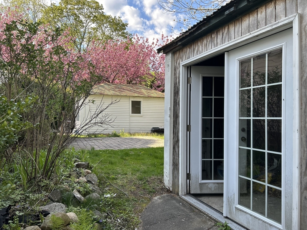 32 Parker Street, Unit 1 Lexington, MA 02421 - Photo 19 of 20 a view of house with backyard