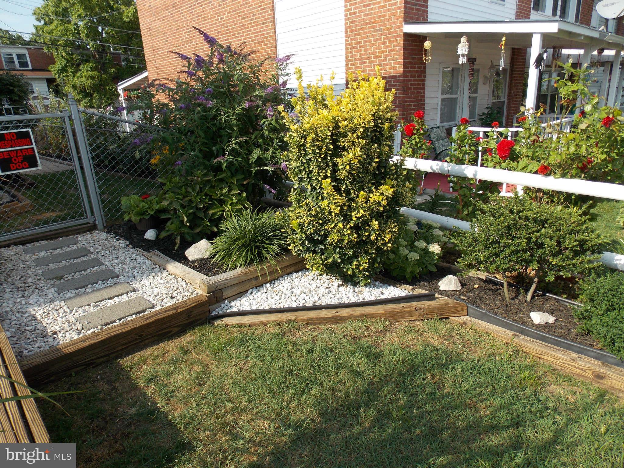 7910 Wynbrook Road Baltimore, MD 21224 - Photo 14 of 17 Front Yard Landscaping
