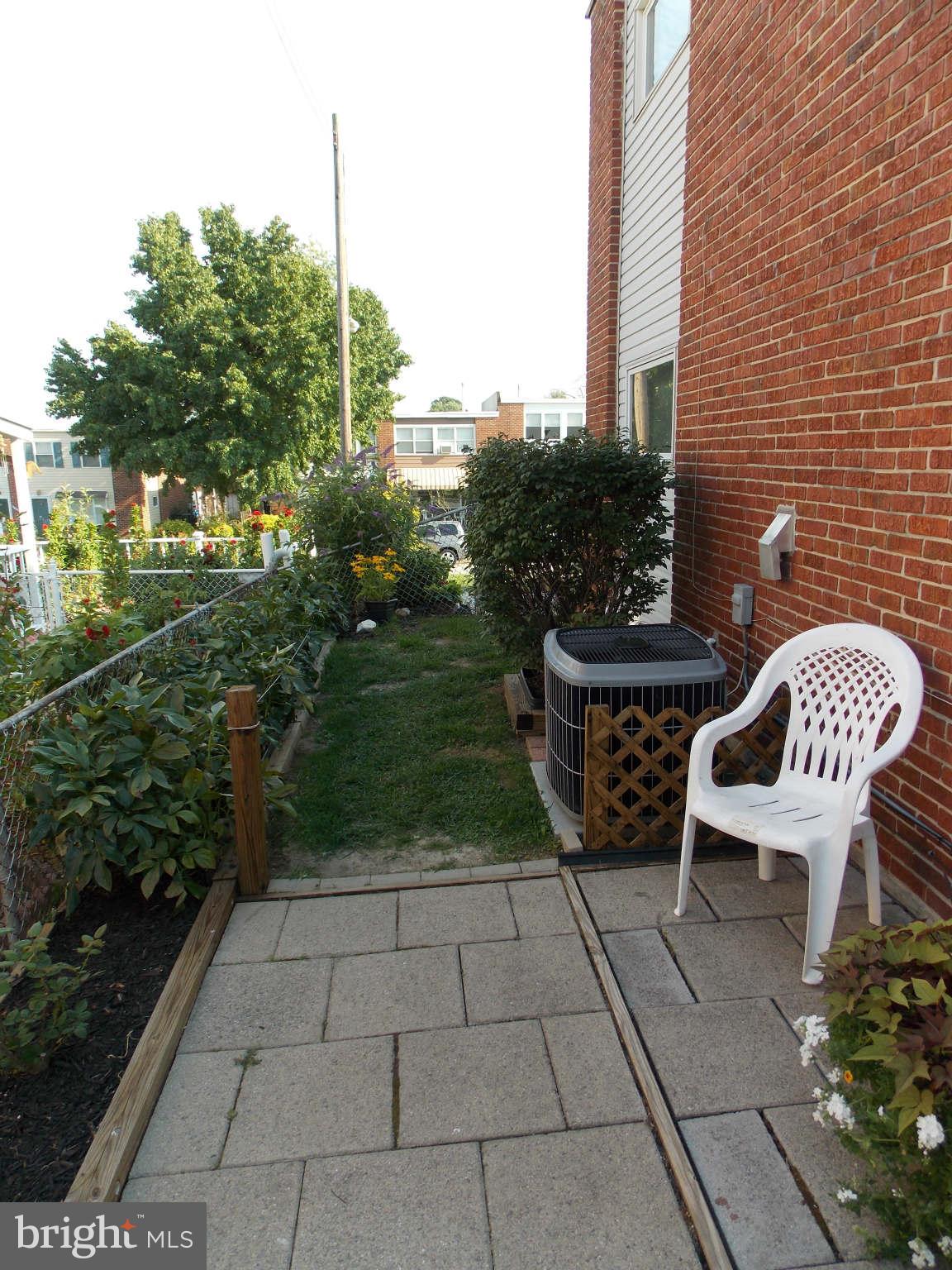 7910 Wynbrook Road Baltimore, MD 21224 - Photo 16 of 17 Side Yard & Patio