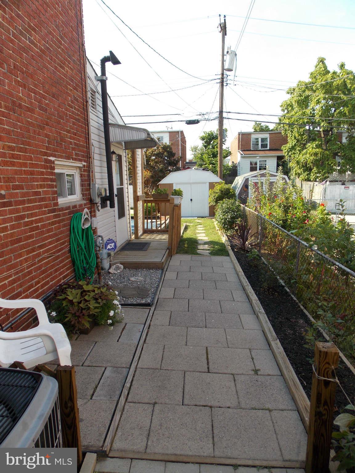 7910 Wynbrook Road Baltimore, MD 21224 - Photo 17 of 17 Side Yard & Patio