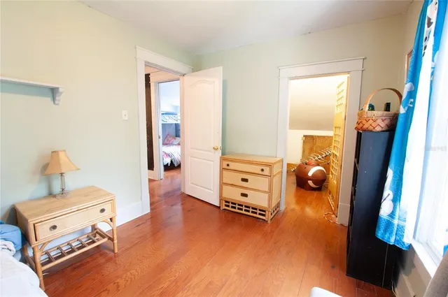 a room with furniture and a wooden floor