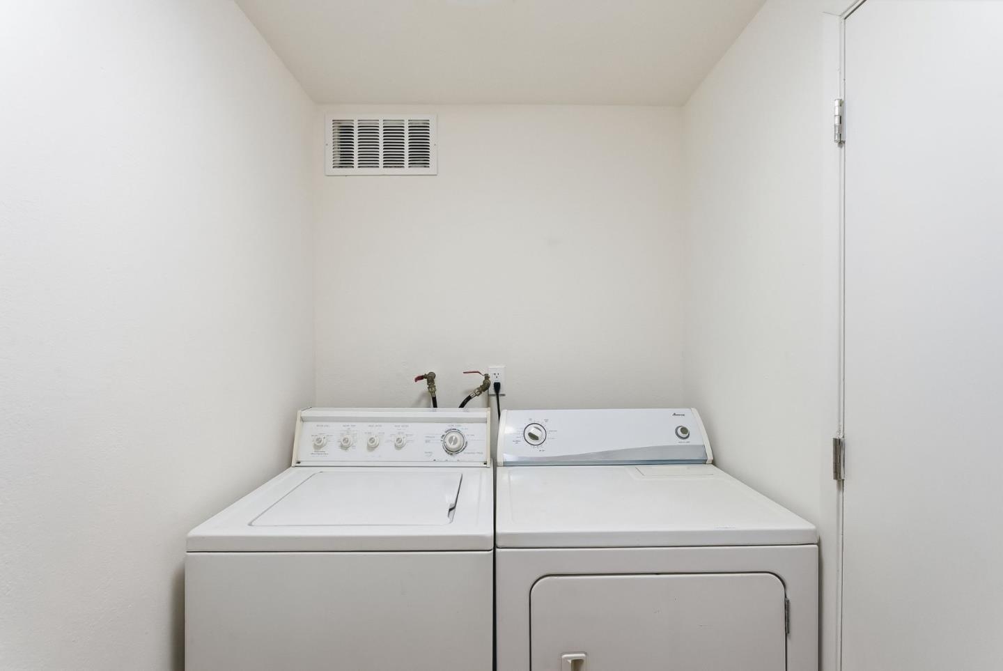 7147 Rouse Court San Jose, CA 95139 - Photo 15 of 36 a utility room with dryer and washer