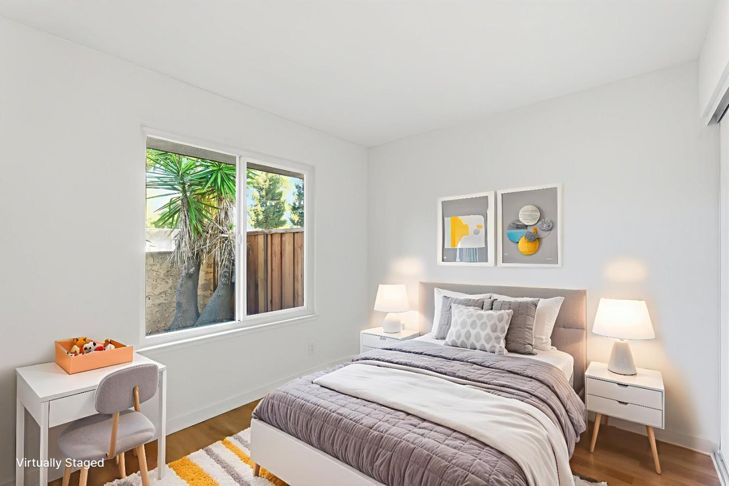 7147 Rouse Court San Jose, CA 95139 - Photo 16 of 36 a bedroom with furniture and a window