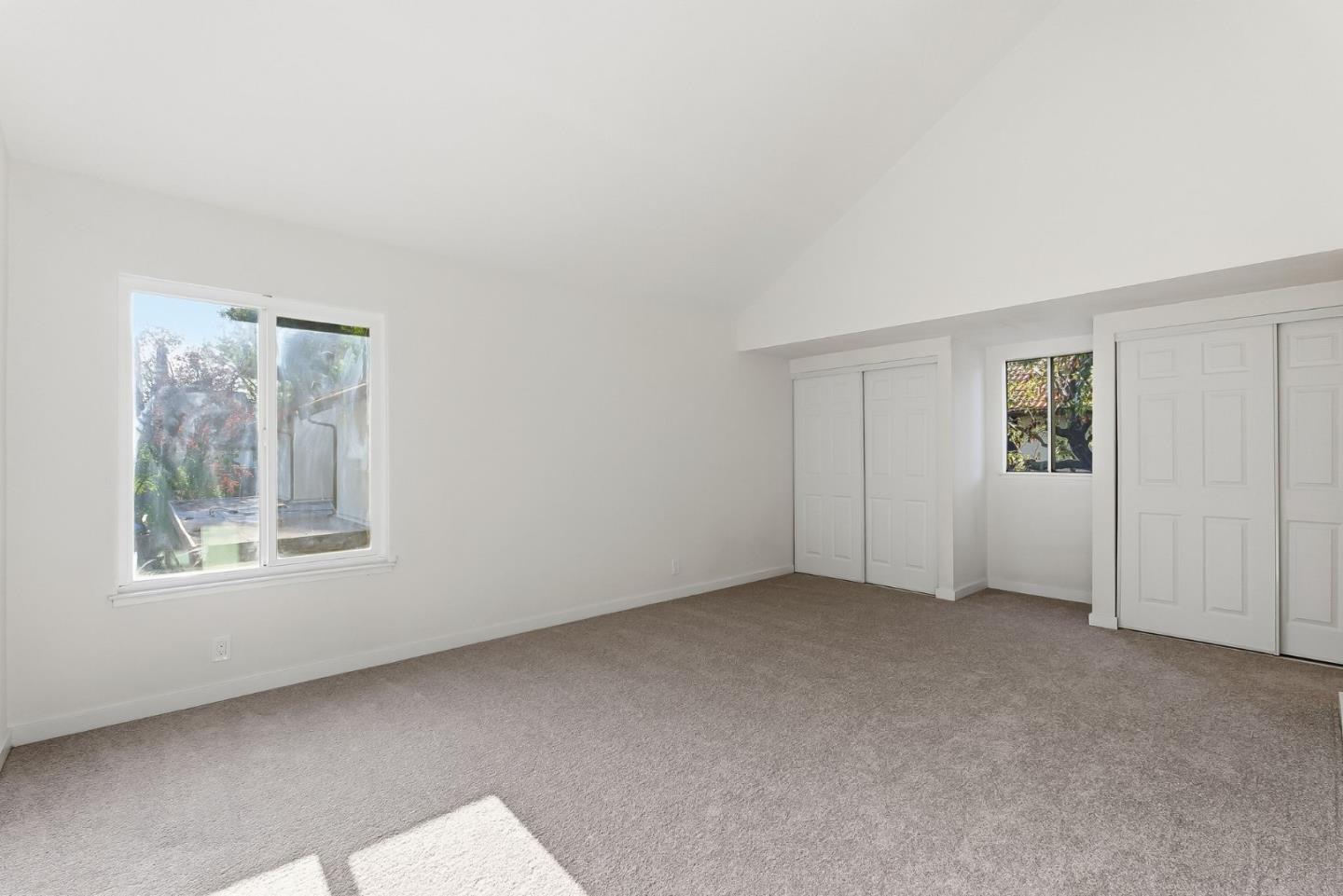 7147 Rouse Court San Jose, CA 95139 - Photo 22 of 36 an empty room with windows and closet