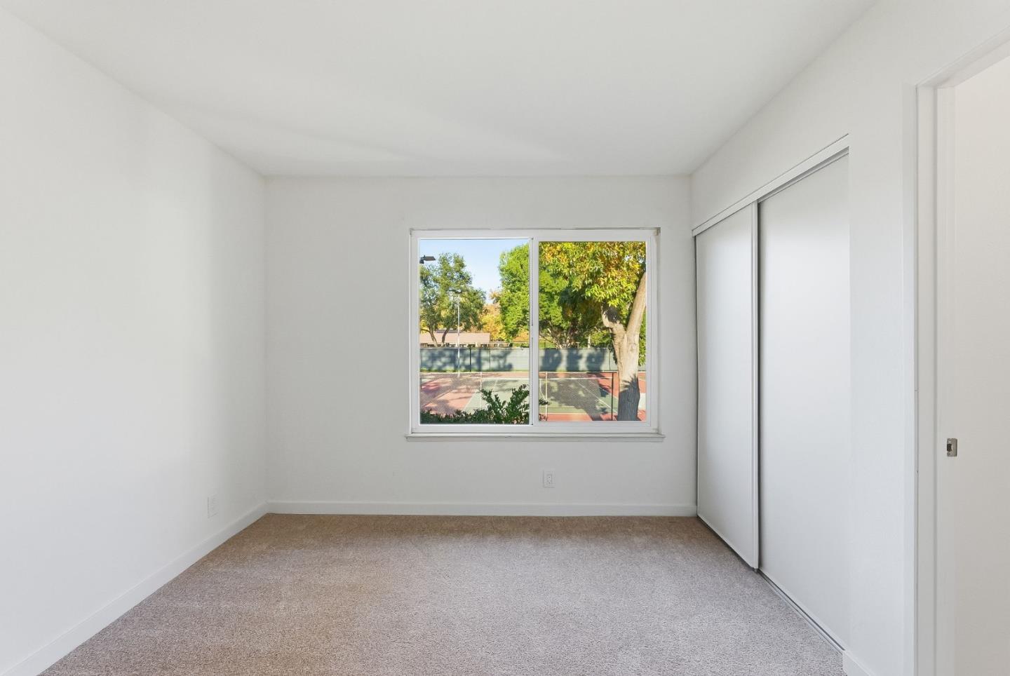 7147 Rouse Court San Jose, CA 95139 - Photo 29 of 36 an empty room with windows