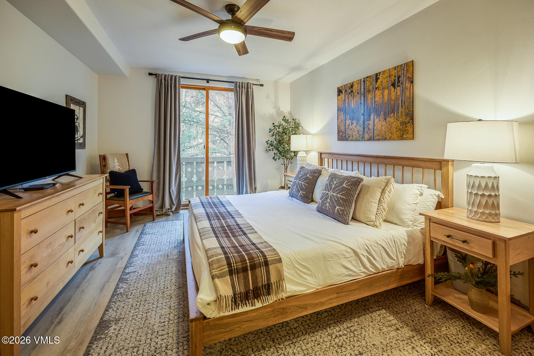 30 Cresta Road, Unit 306 Edwards, CO 81632 - Photo 13 of 26 a bedroom with a bed and a flat screen tv