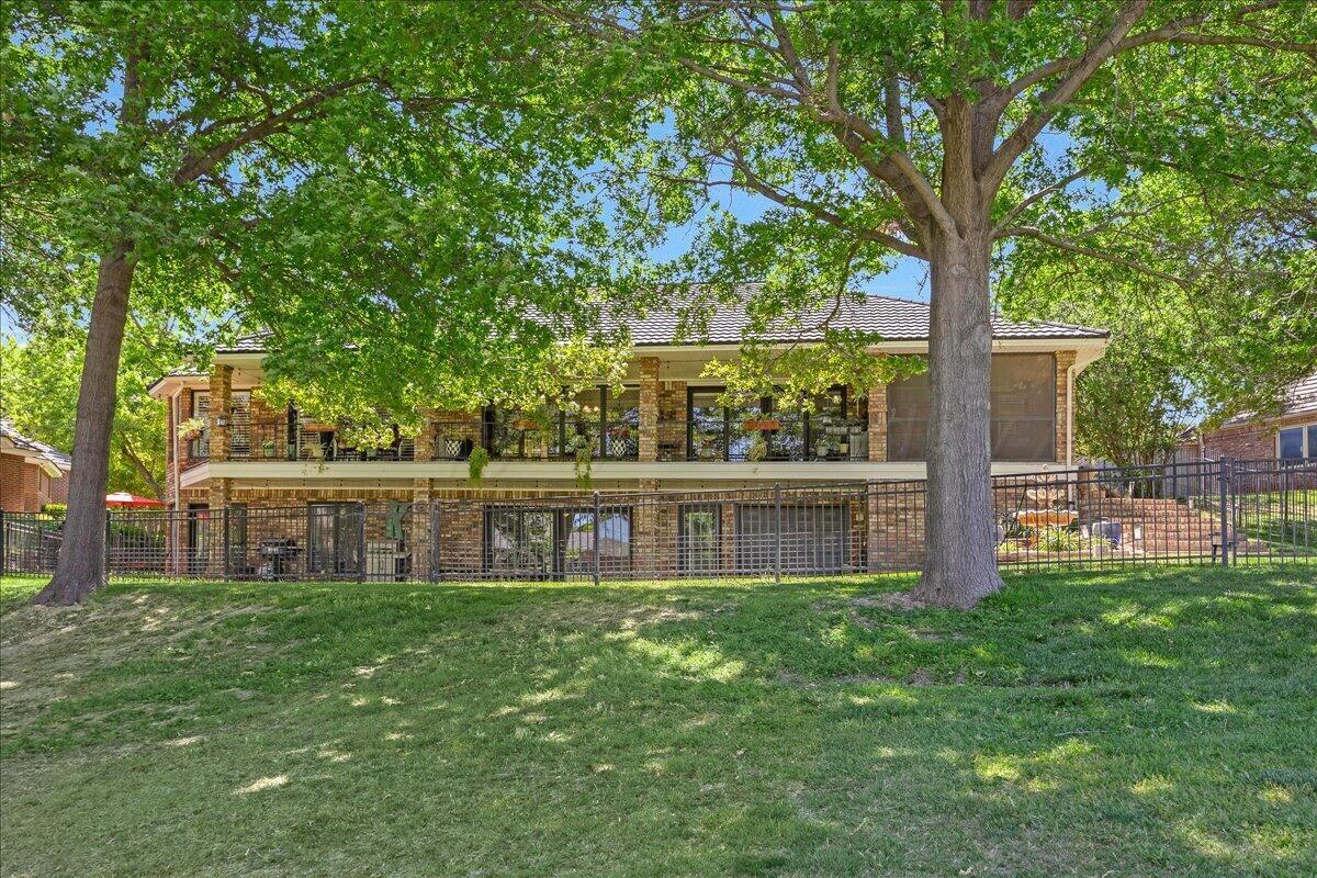 5 Locke Place Amarillo, TX 79124 - Photo 45 of 53 a house view with swimming pool in front of it