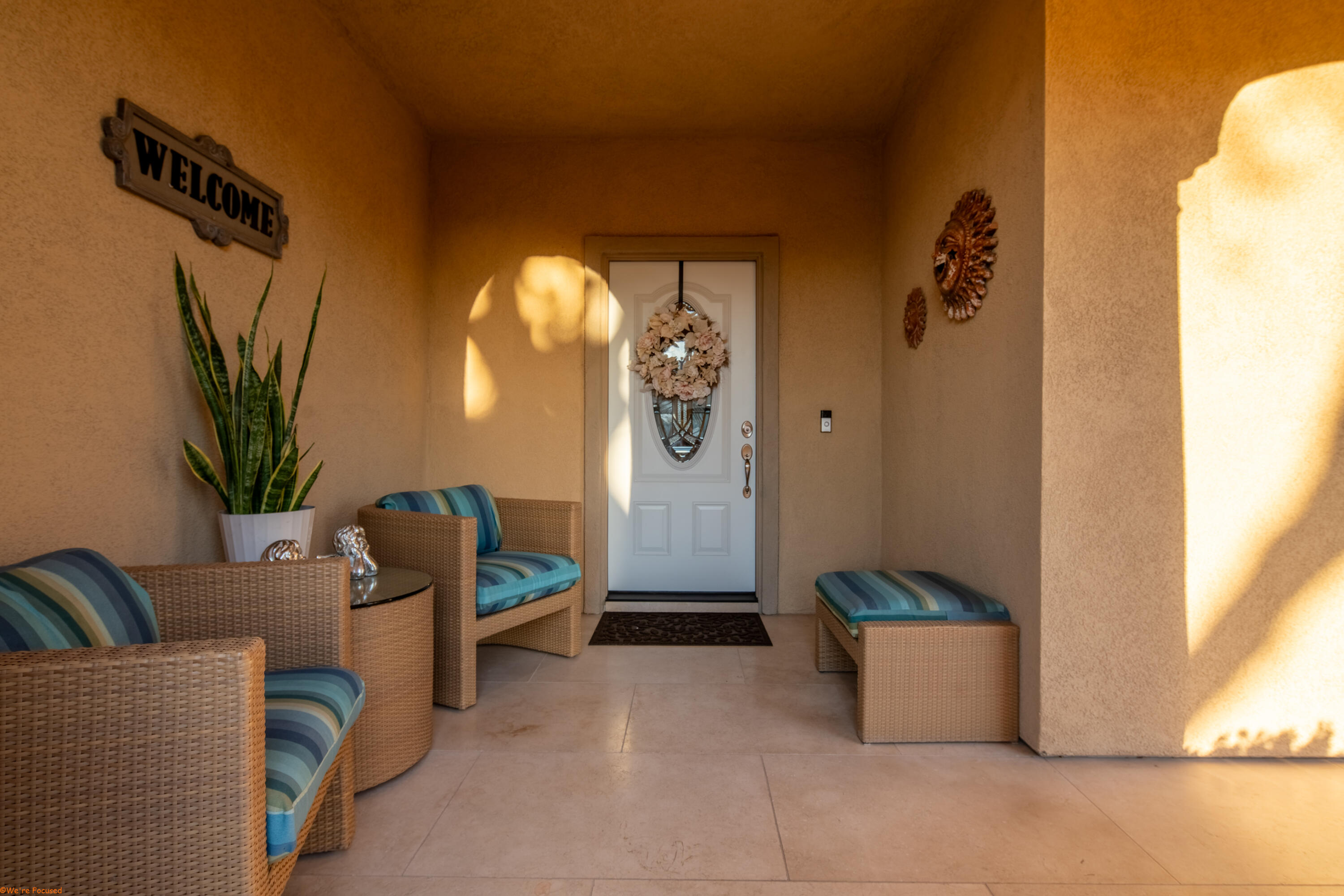 41126 Prospect Court Indio, CA 92203 - Photo 11 of 69 a living room with furniture and a potted plant