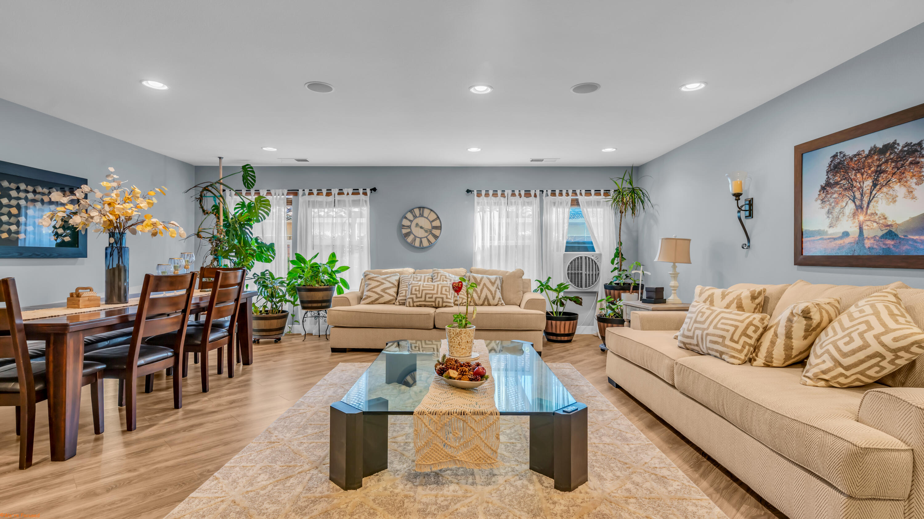 41126 Prospect Court Indio, CA 92203 - Photo 15 of 69 a living room with furniture potted plant and kitchen view