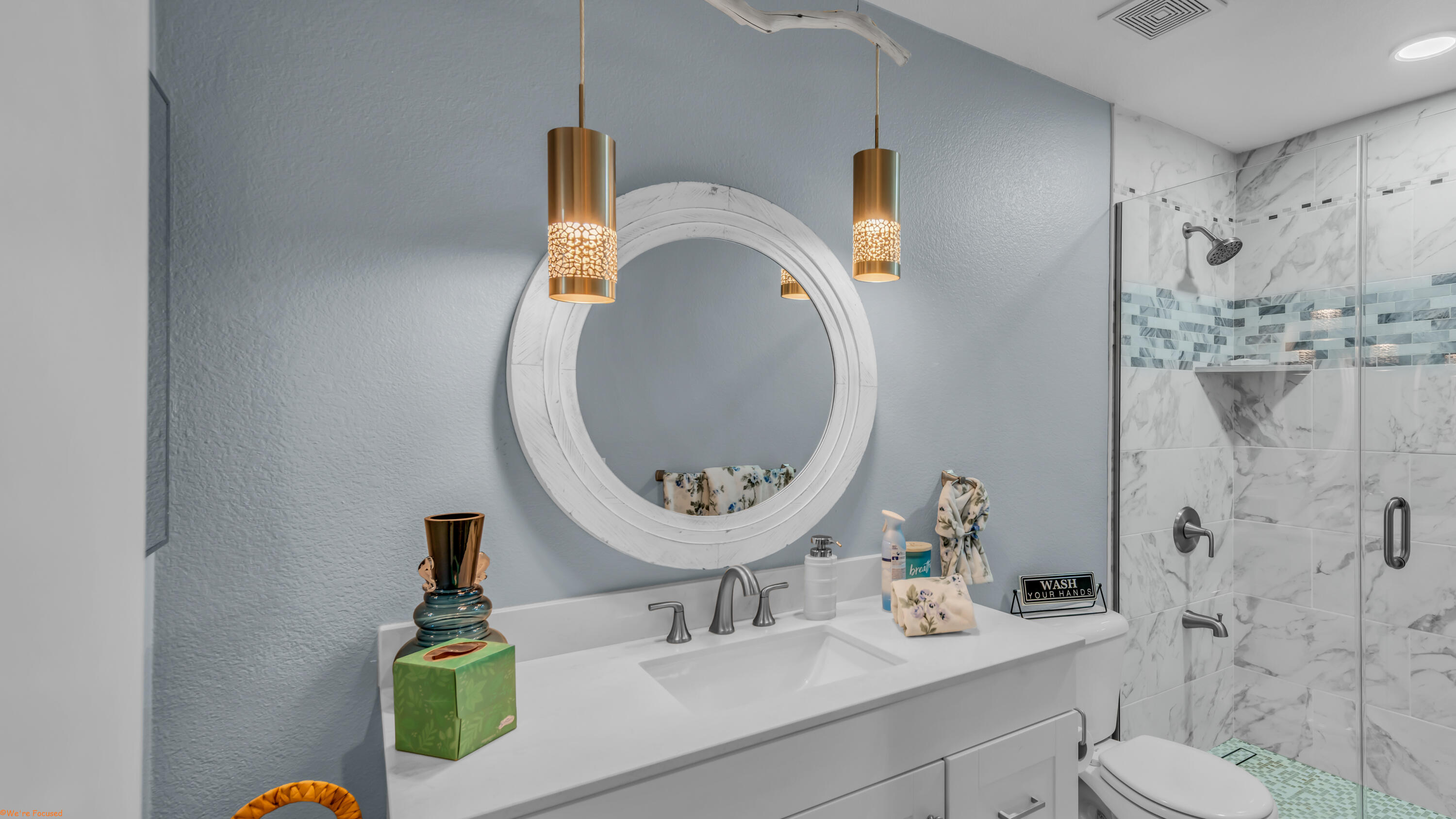 41126 Prospect Court Indio, CA 92203 - Photo 37 of 69 a bathroom with a sink mirror and toilet