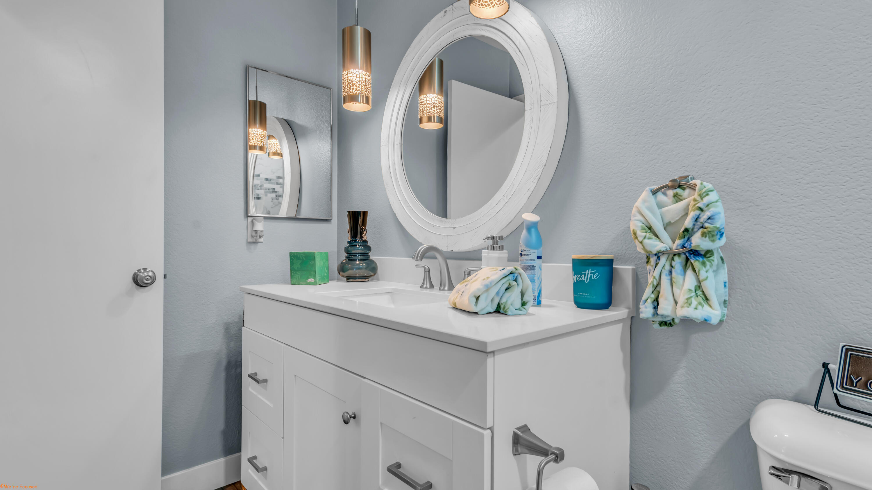 41126 Prospect Court Indio, CA 92203 - Photo 39 of 69 a bathroom with a sink mirror and toilet