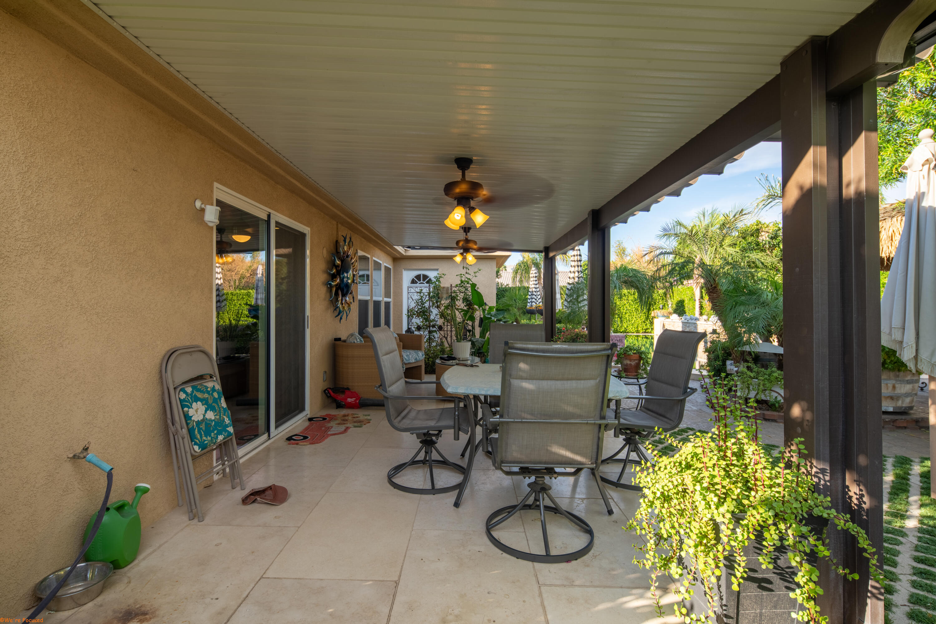 41126 Prospect Court Indio, CA 92203 - Photo 58 of 69 a view of a chairs and table in patio next to a yard