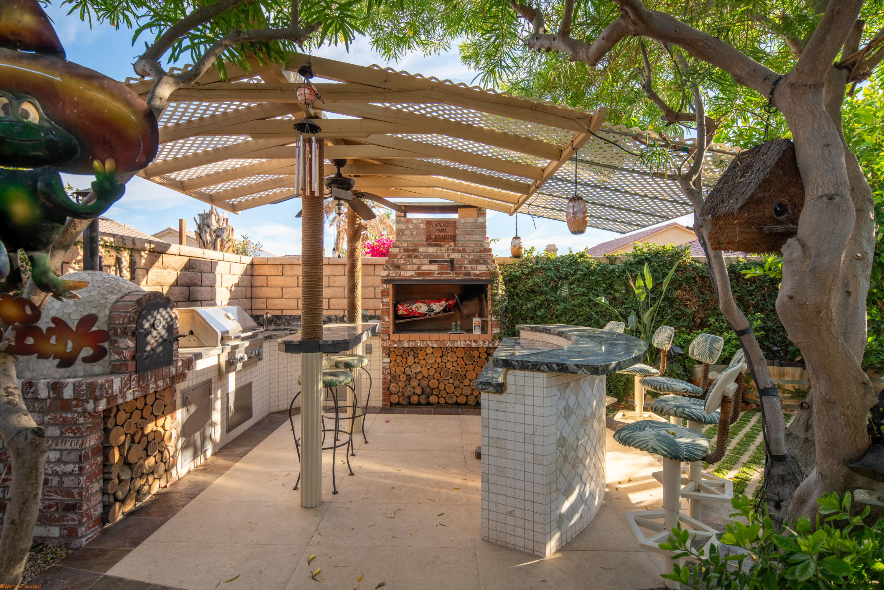 41126 Prospect Court Indio, CA 92203 - Photo 64 of 69 a view of a patio with table and chairs potted plants