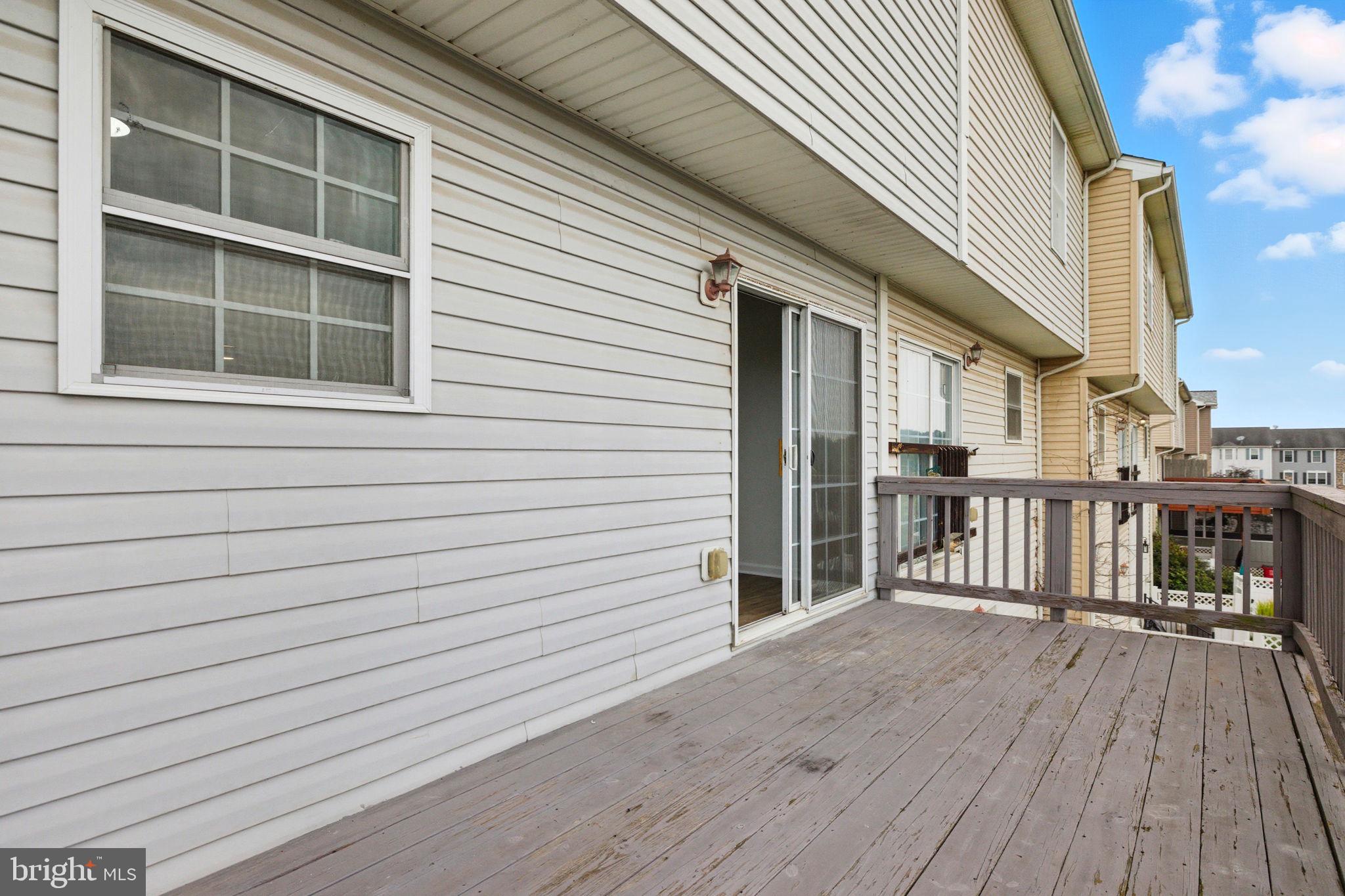 55 Fuzzy Tail Drive Ranson, WV 25438 - Photo 12 of 61 a view of a house with a deck
