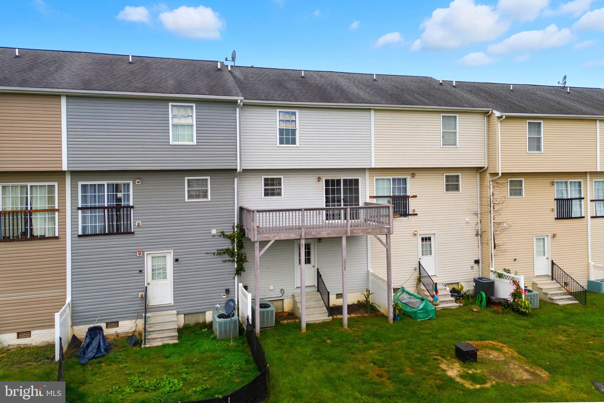 55 Fuzzy Tail Drive Ranson, WV 25438 - Photo 2 of 61 a view of a house with garden
