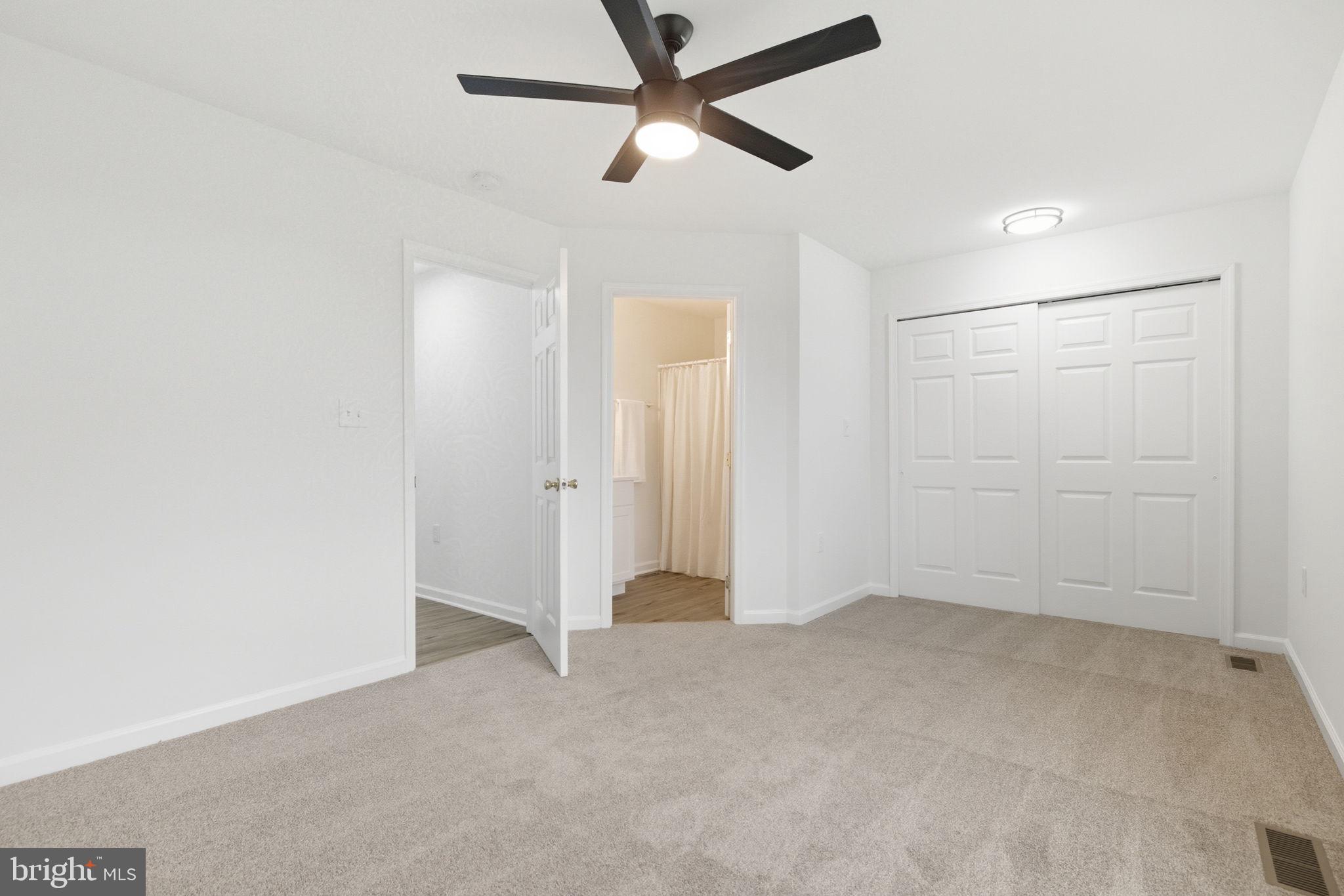 55 Fuzzy Tail Drive Ranson, WV 25438 - Photo 22 of 61 a view of an empty room