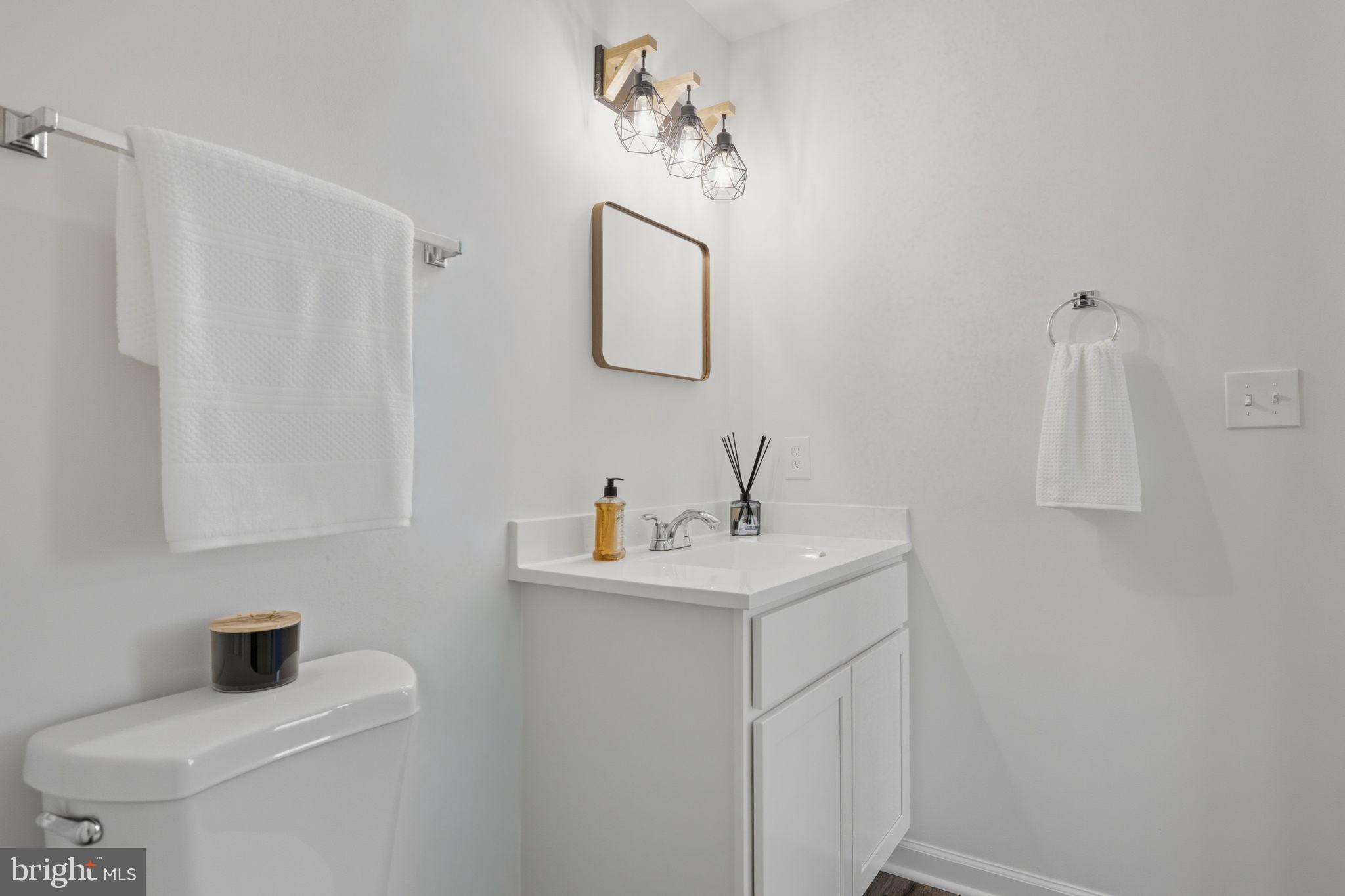 55 Fuzzy Tail Drive Ranson, WV 25438 - Photo 32 of 61 a bathroom with a sink and a mirror