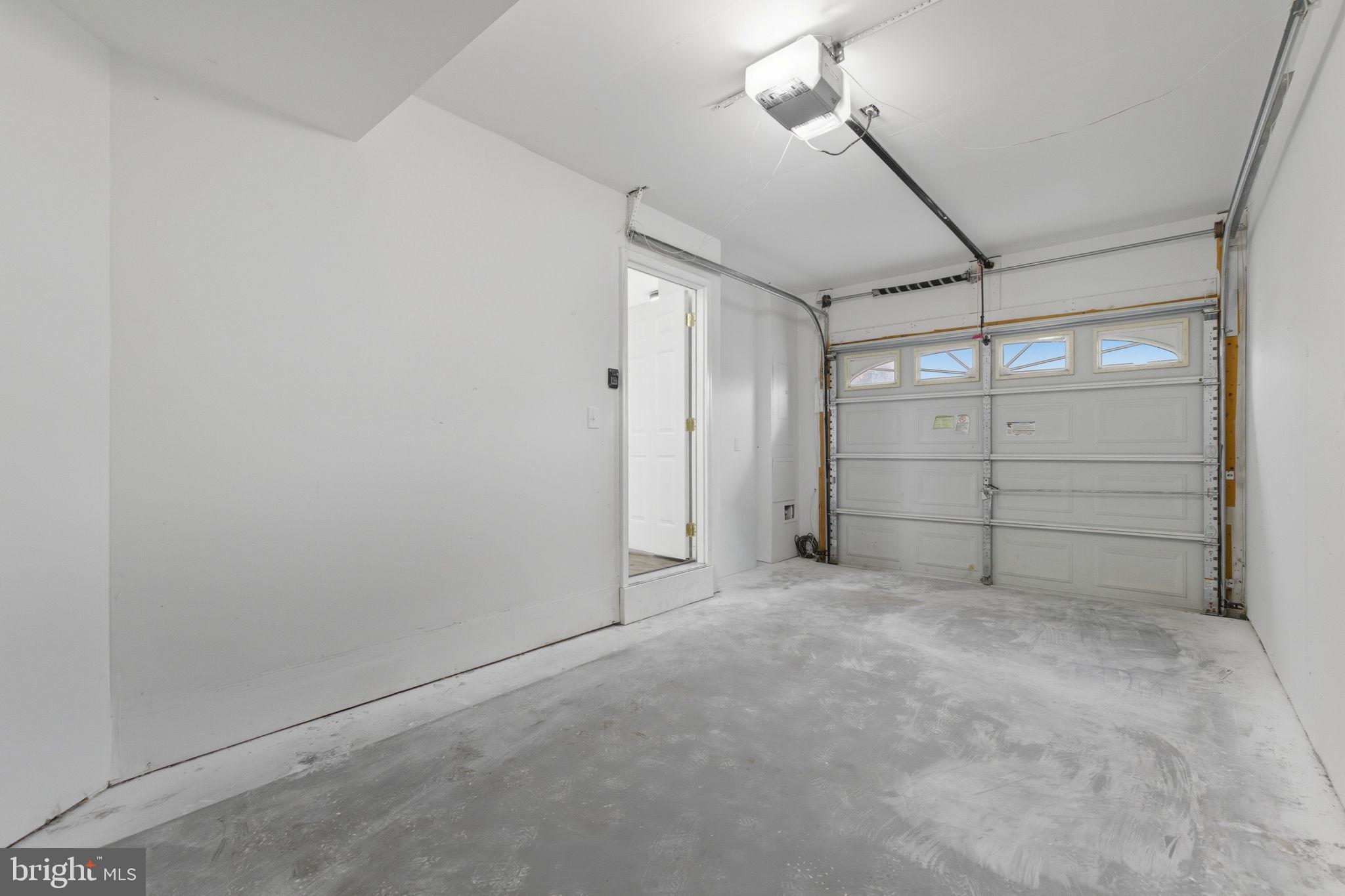 55 Fuzzy Tail Drive Ranson, WV 25438 - Photo 45 of 61 a view of a garage