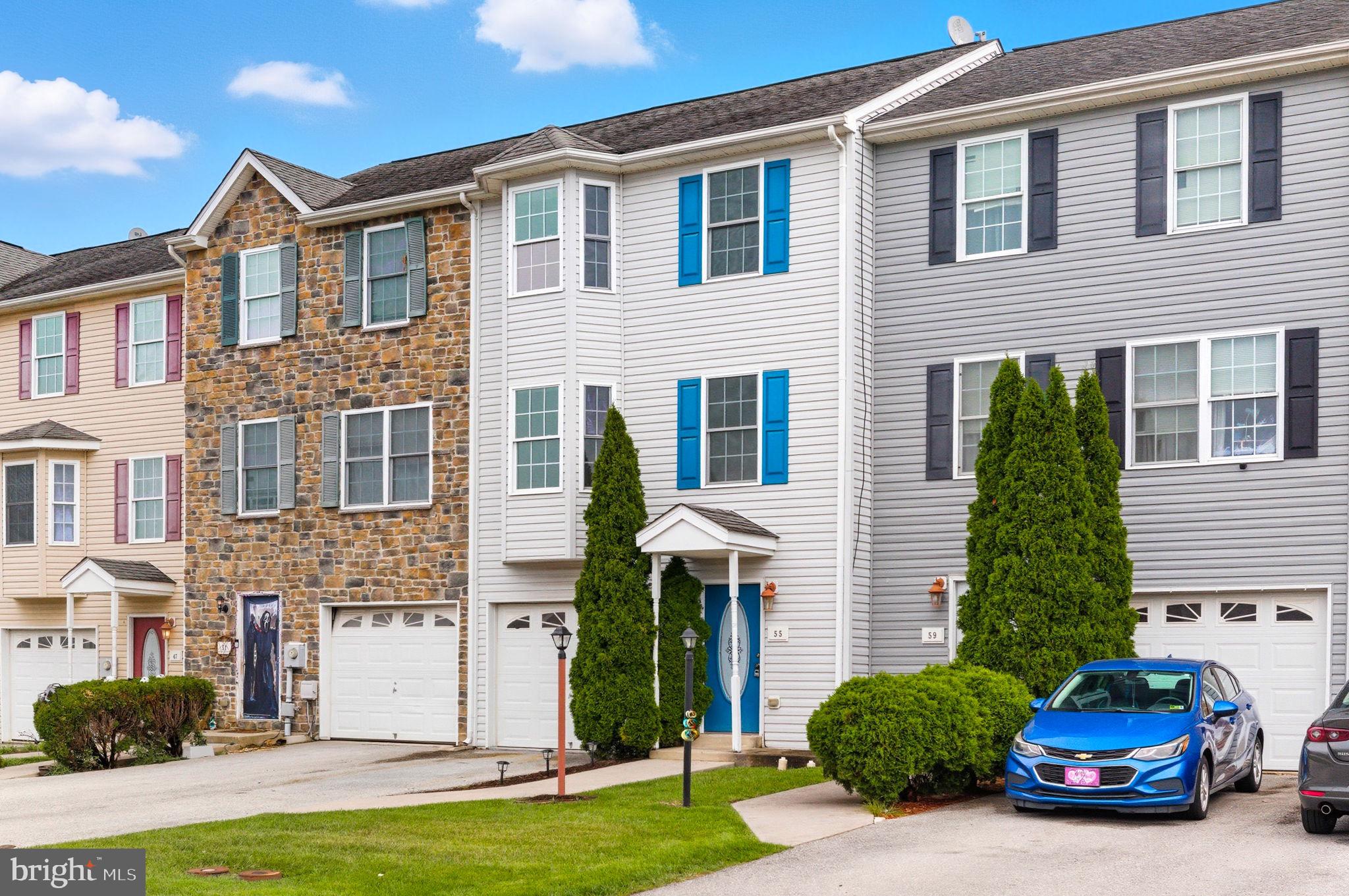 55 Fuzzy Tail Drive Ranson, WV 25438 - Photo 47 of 61 a car parked in front of a house