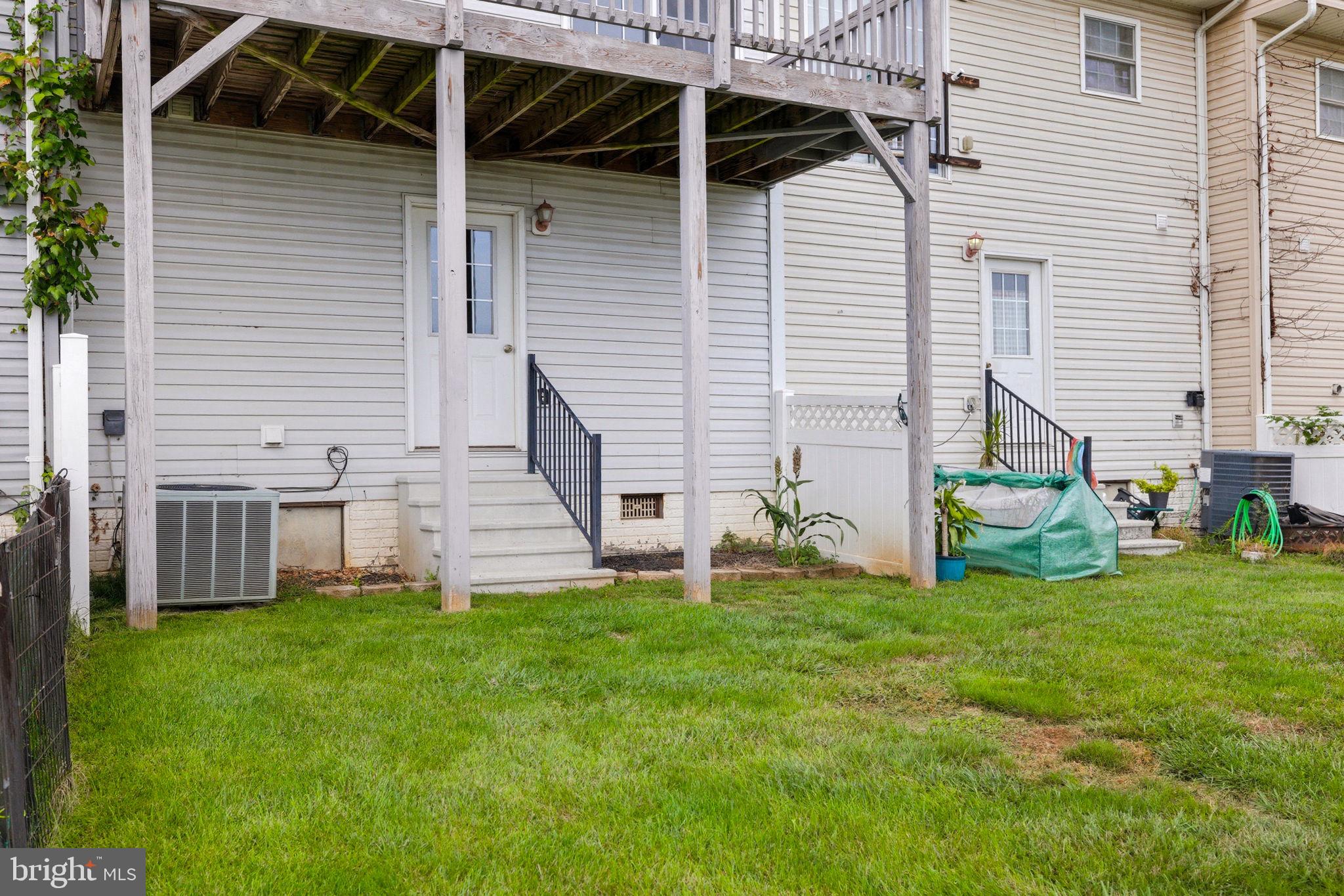 55 Fuzzy Tail Drive Ranson, WV 25438 - Photo 49 of 61 a view of a house with backyard