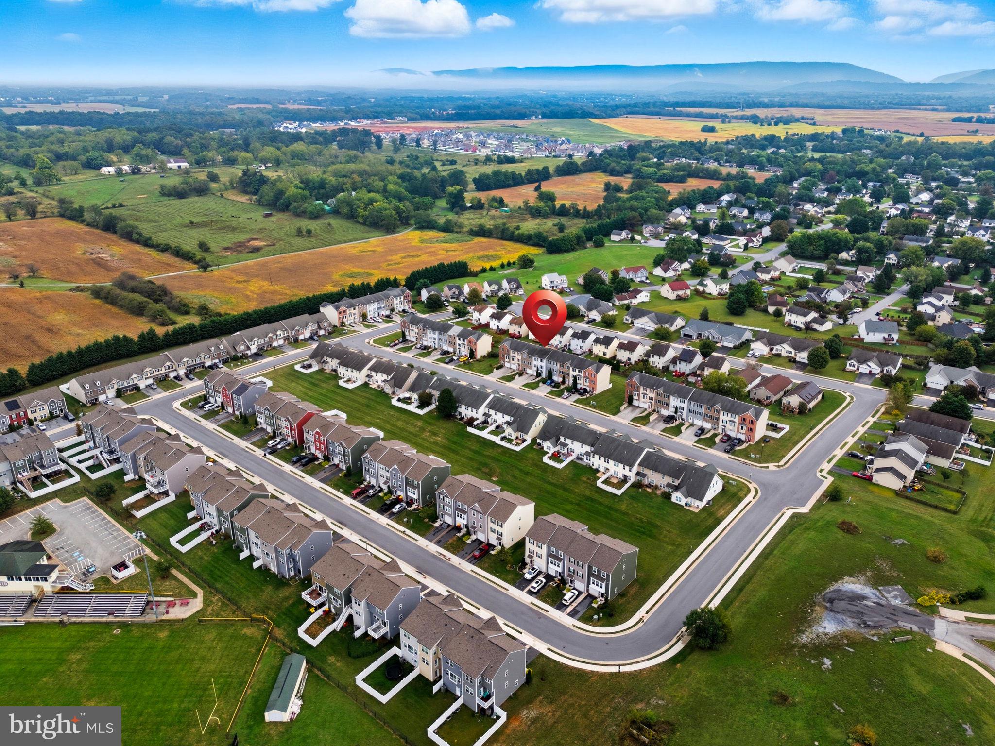 55 Fuzzy Tail Drive Ranson, WV 25438 - Photo 51 of 61 an aerial view of a pool table and mountain