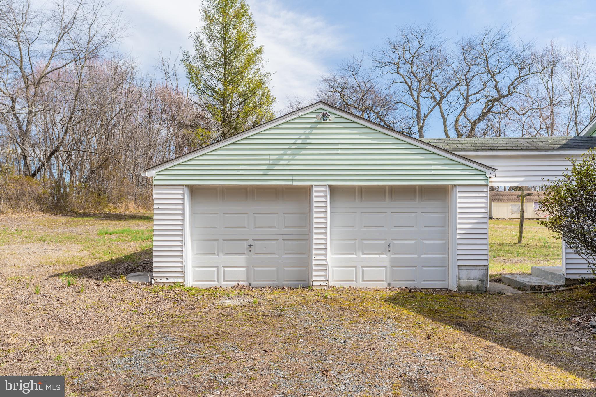 264 Union Church Road Elkton, MD 21921 - Photo 10 of 12 a front view of a house with a yard and garage
