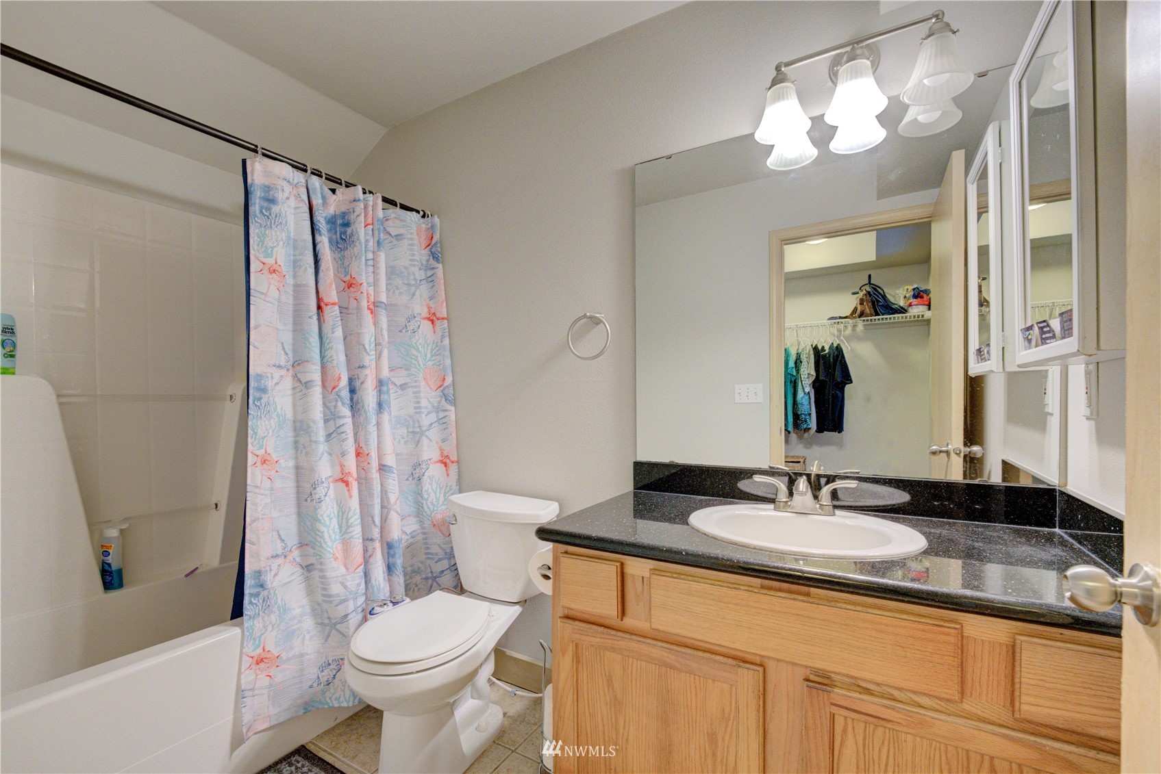 5809 Hwy Place, Unit B103 Everett, WA 98203 - Photo 23 of 30 a bathroom with a sink toilet and shower