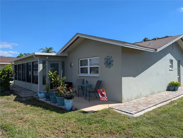 a view of a park with a tree