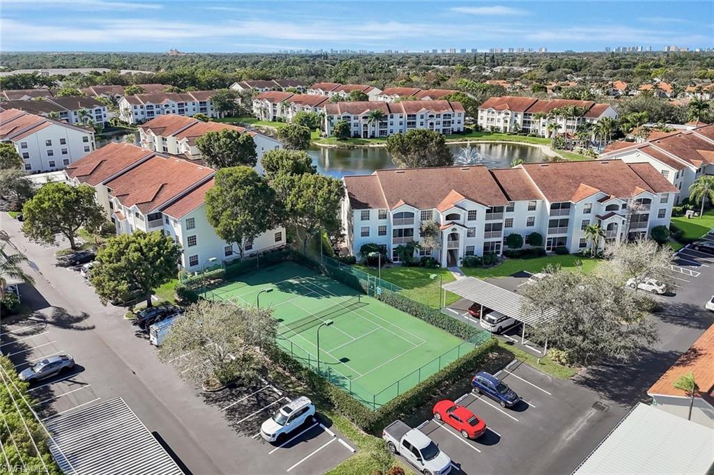 4620 St Croix Lane, Unit 911 Naples, FL 34109 - Photo 20 of 26 Bird's eye view of the tennis courts